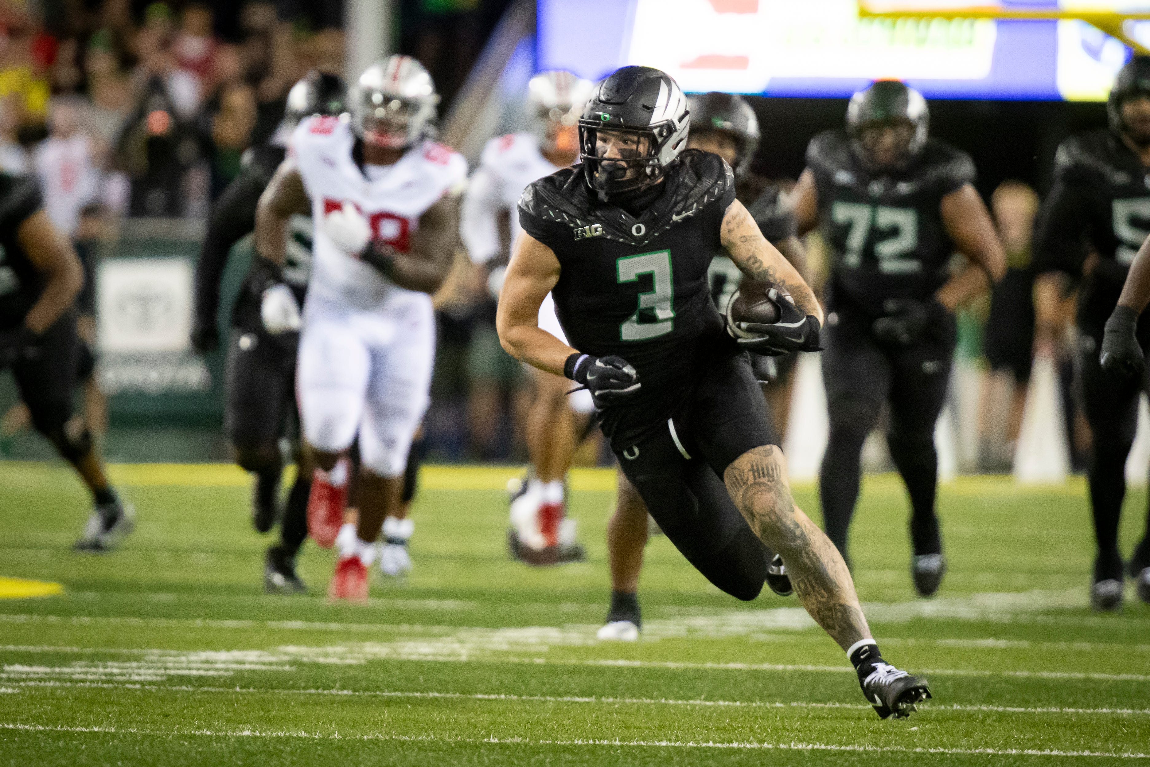 Oregon Ducks tight end Terrance Ferguson carries the ball for the Ducks as the No. 3 Oregon Ducks host the No. 2 Ohio State Buckeyes Saturday, Oct. 12, 2024 at Autzen Stadium in Eugene, Ore.