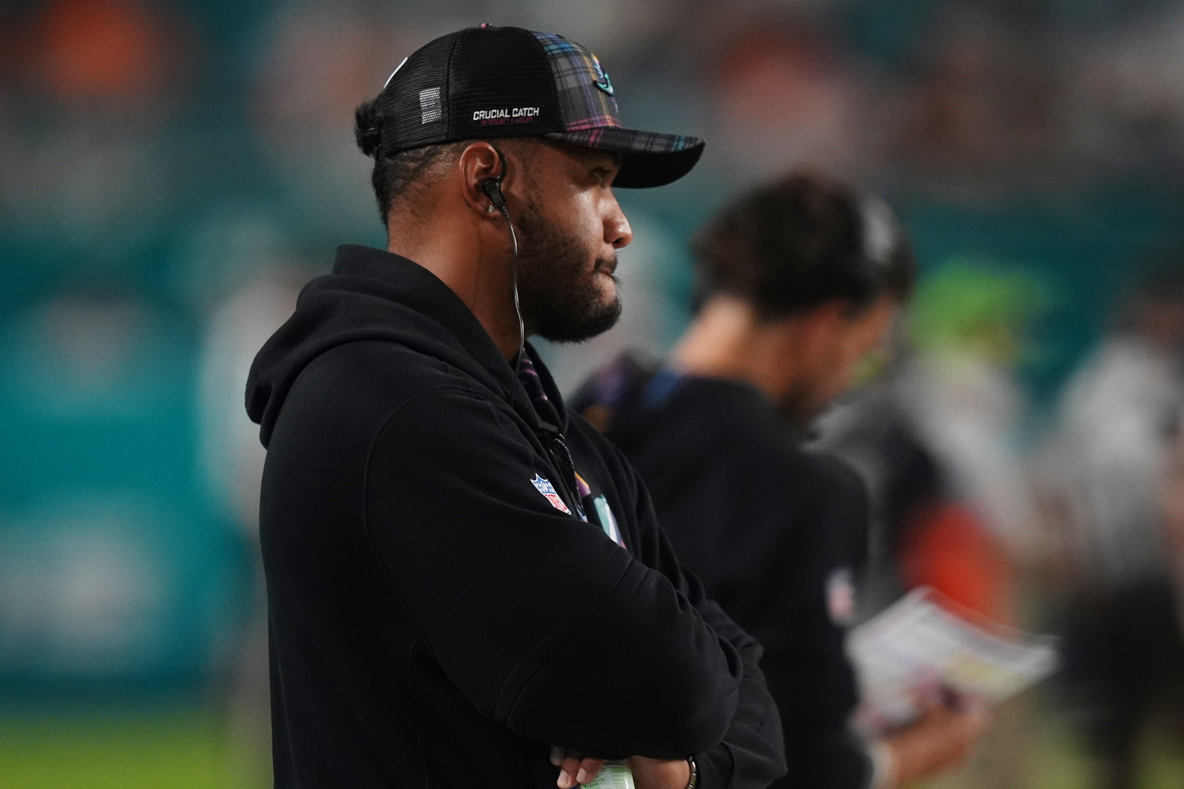 Miami Dolphins quarterback Tua Tagovailoa stands on the sidelines during the second half against the Tennessee Titans at Hard Rock Stadium. 