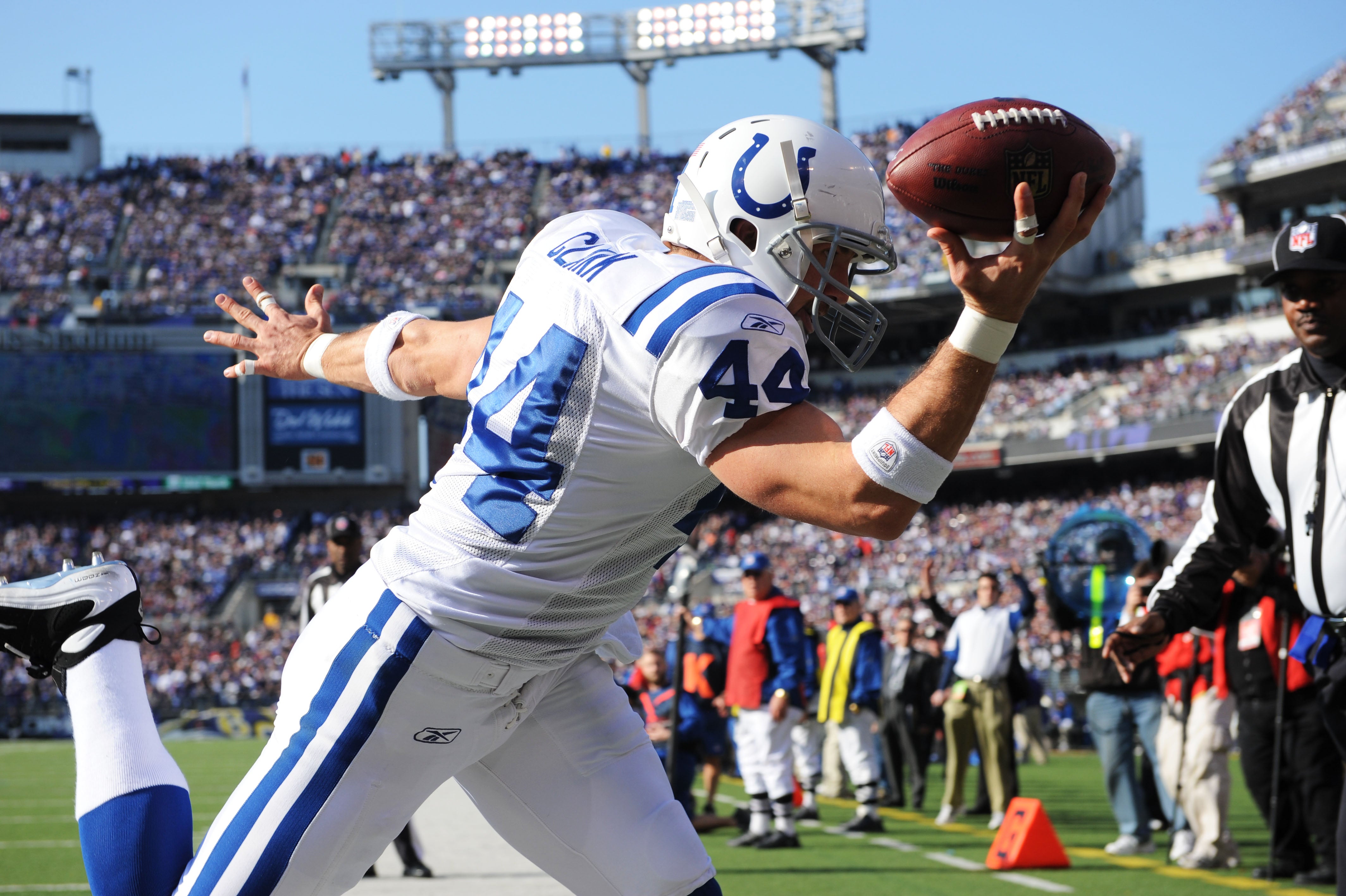 November 22, 2009; Baltimore, MD, USA; Indianapolis Colts tight end Dallas Clark (44) holds the ball after making a one-handed catch for a touchdown in the first quarter against the Baltimore Ravens at M&T Bank Stadium.