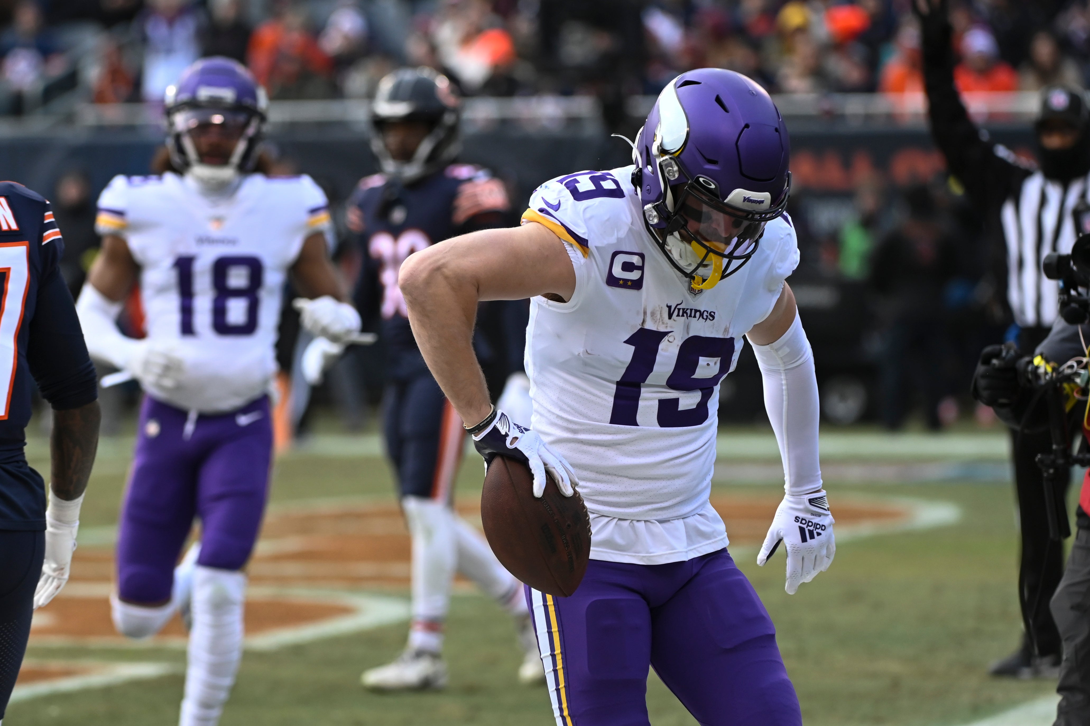 Jan 8, 2023; Chicago, Illinois, USA; Minnesota Vikings wide receiver Adam Thielen (19) celebrates his touchdown against the Chicago Bears during the first half at Soldier Field.