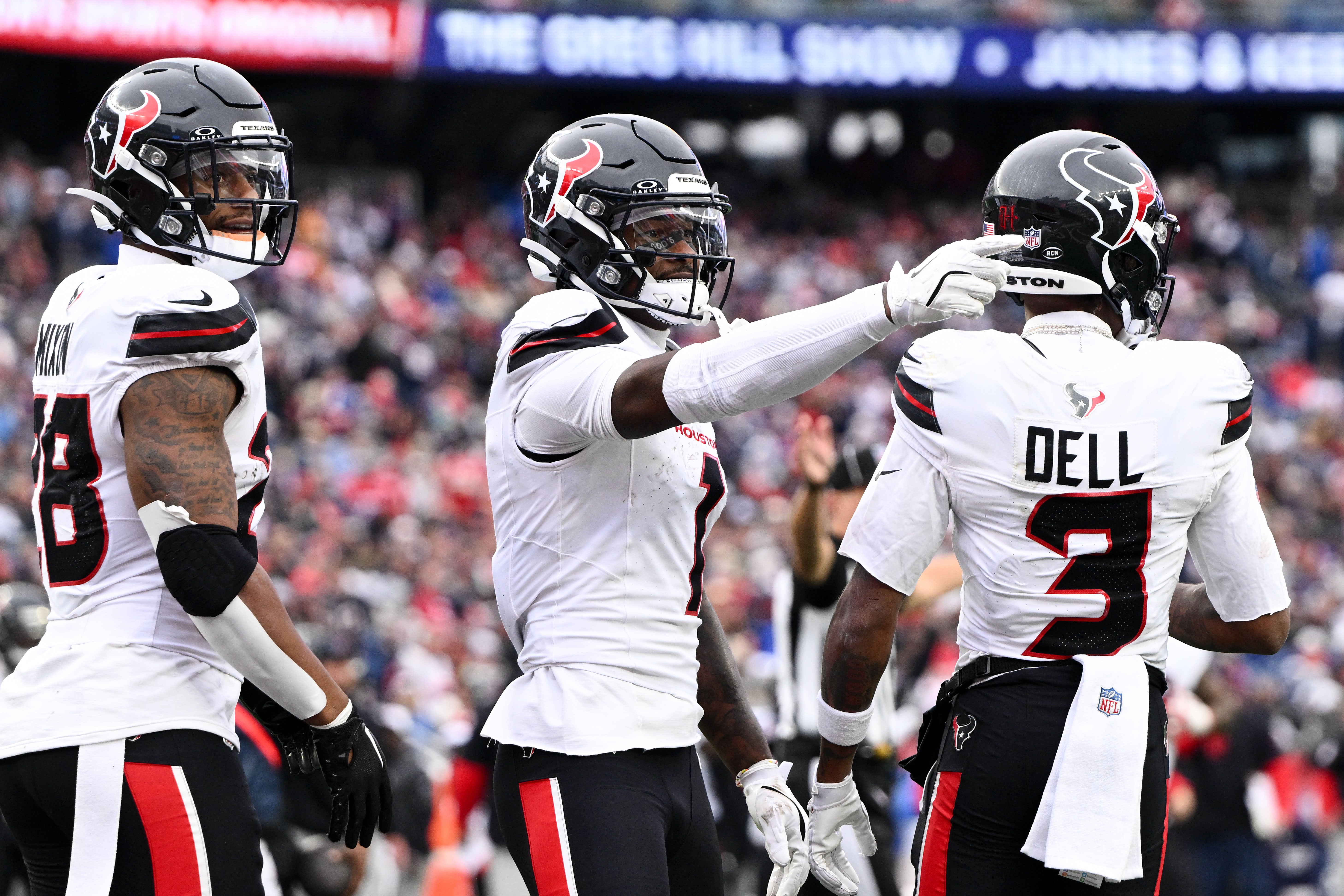 Oct 13, 2024; Foxborough, Massachusetts, USA; Houston Texans wide receiver Stefon Diggs (1) celebrates after scoring a touchdown against the New England Patriots during the second half at Gillette Stadium.