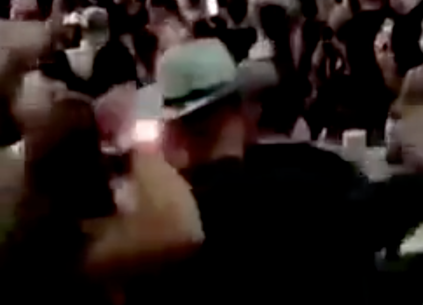 Jason Kelce and Beau Allen dancing to Taylor Swift's live performance of "I Can Do It With A Broken Heart" at her Miami Eras Tour show