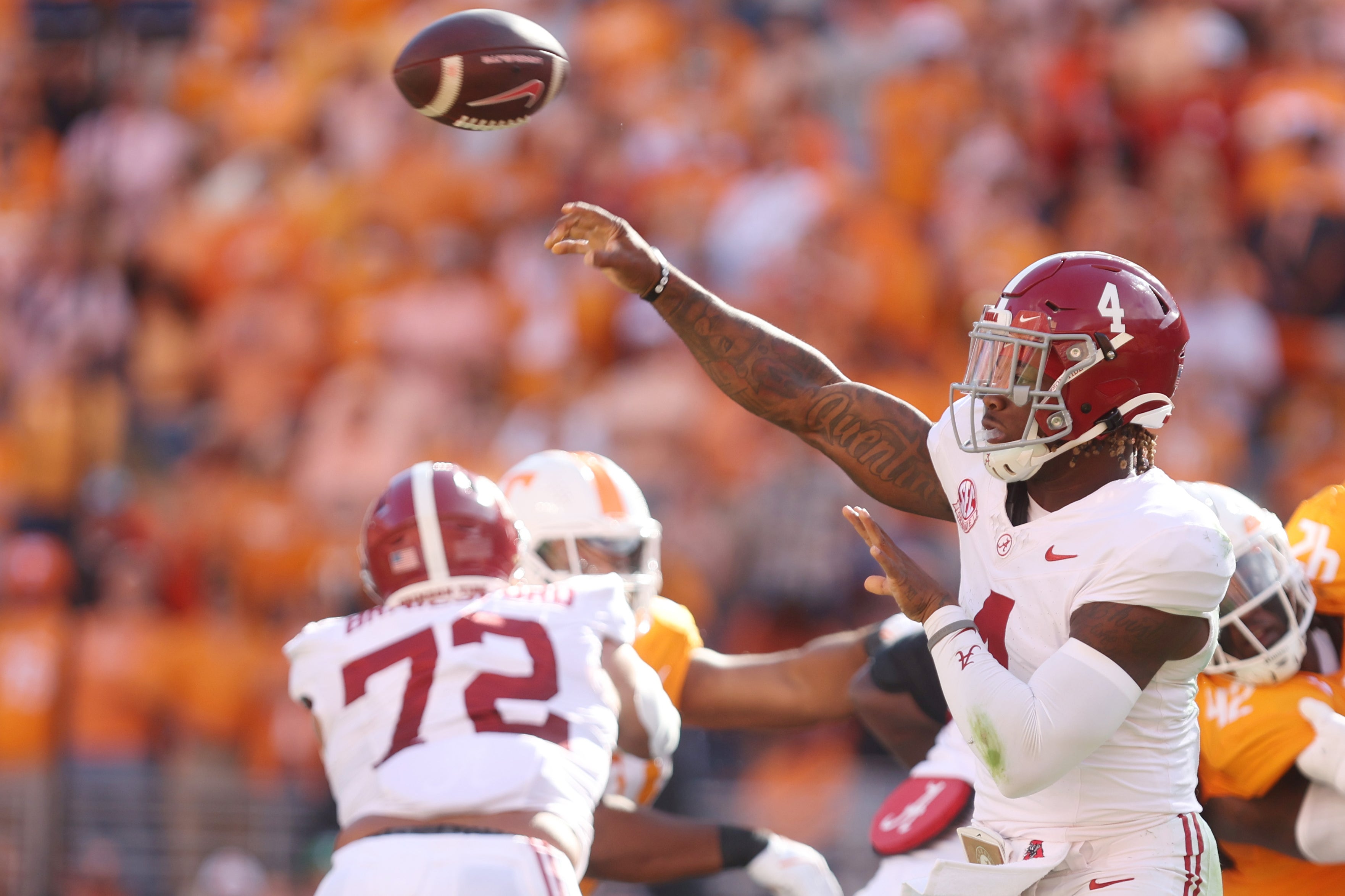 Oct 19, 2024; Knoxville, Tennessee, USA; Alabama Crimson Tide quarterback Jalen Milroe (4) passes the ball against the Tennessee Volunteers during the first quarter at Neyland Stadium.