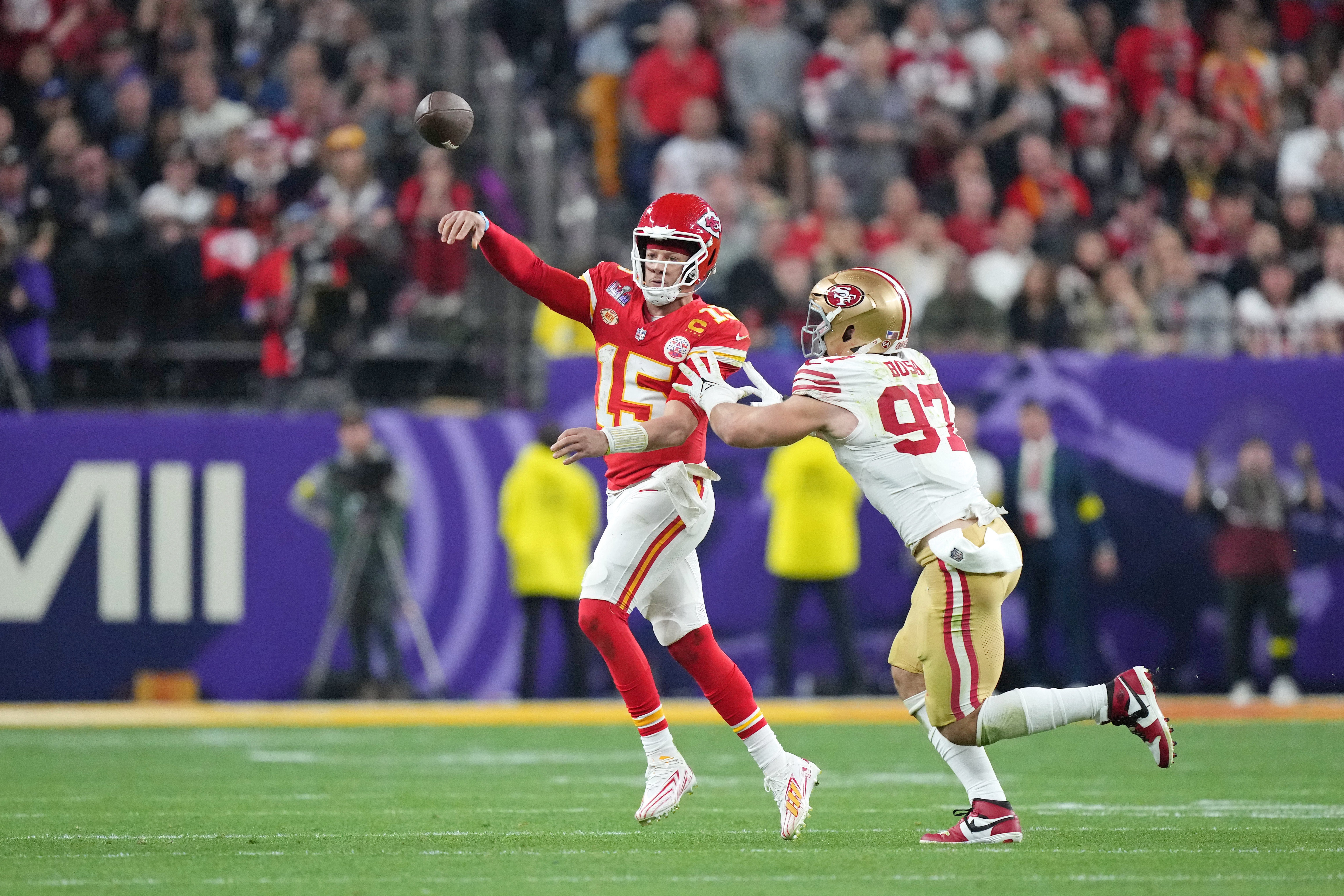 Kansas City Chiefs quarterback Patrick Mahomes (15) passes the ball against the San Francisco 49ers during the third quarter of Super Bowl LVIII at Allegiant Stadium.