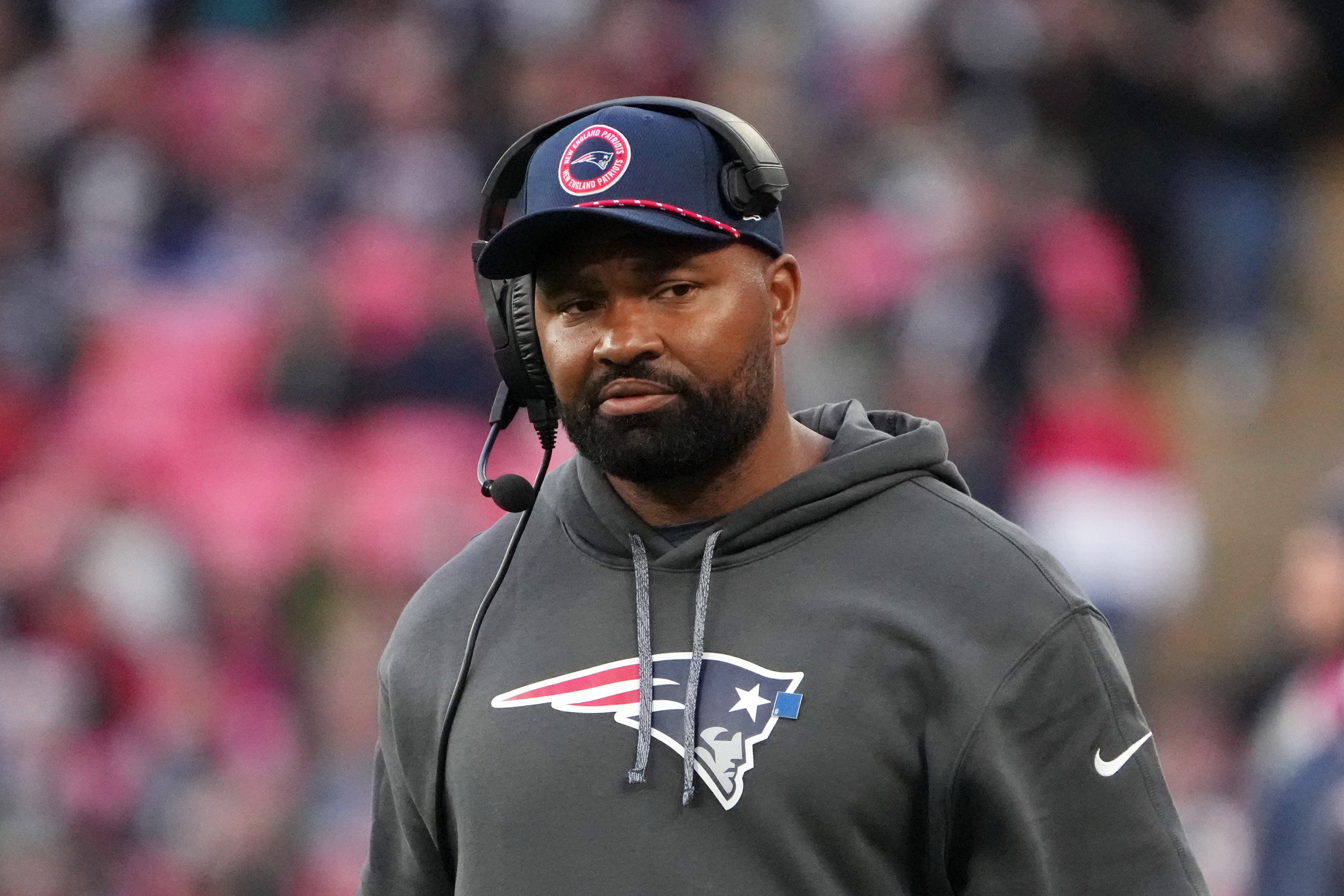 Oct 20, 2024; London, United Kingdom; New England Patriots coach Jerod Mayo watches from the sidelines against the New England Patriots in the second half of an NFL International Series game at Wembley Stadium.