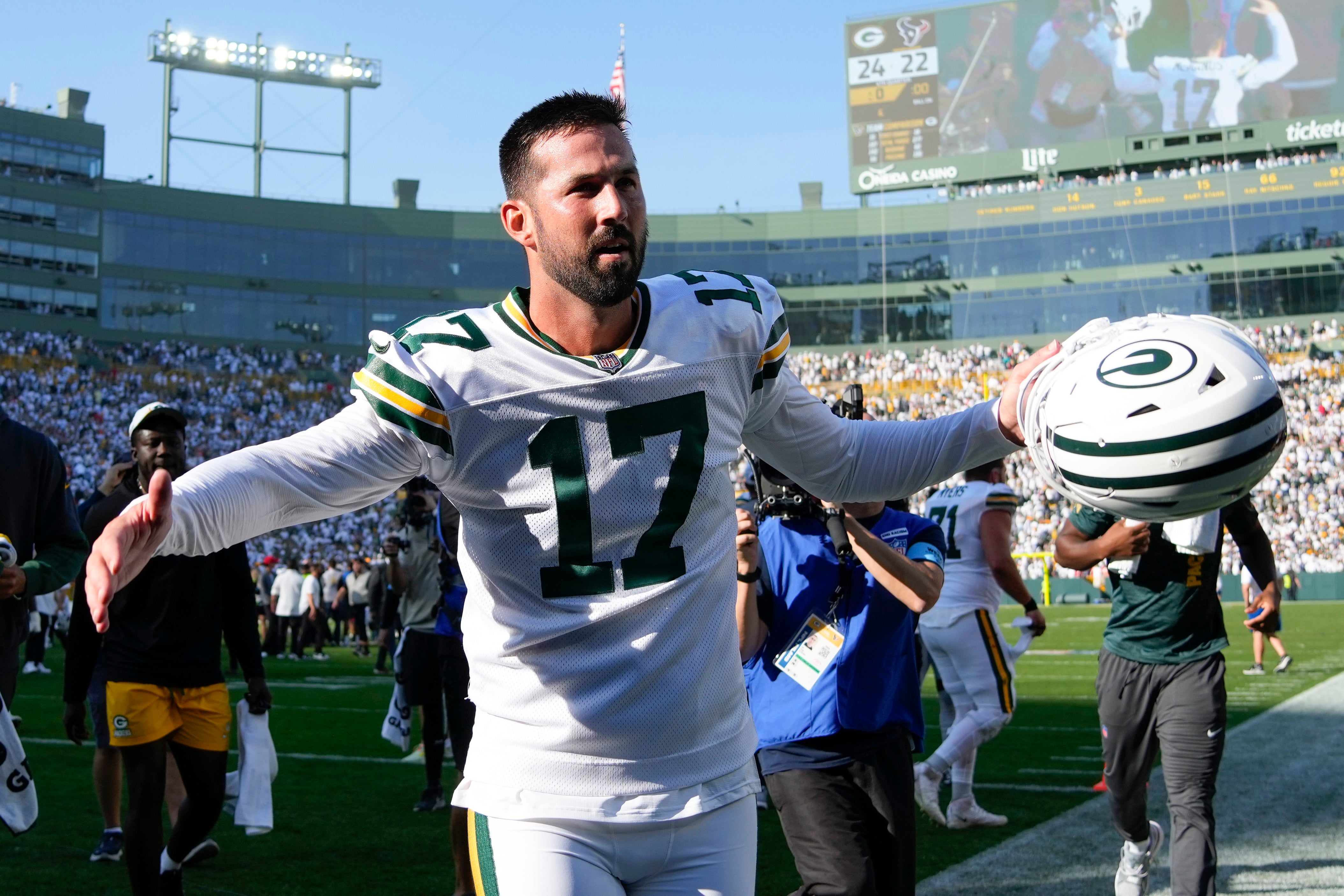 Green Bay Packers kicker Brandon McManus (17) celebrates as he runs off the field following the game against the Houston Texans at Lambeau Field.