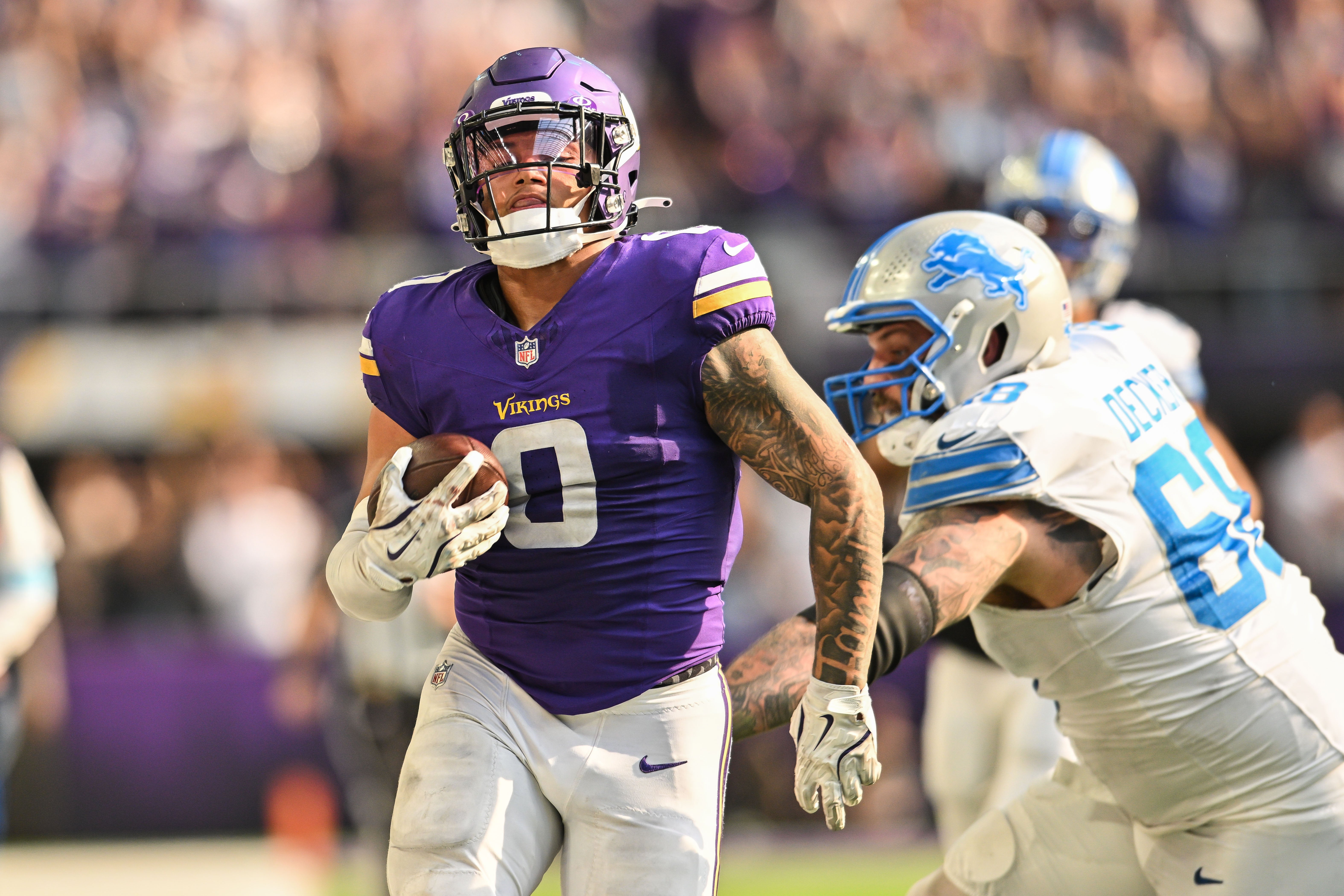 Oct 20, 2024; Minneapolis, Minnesota, USA; Minnesota Vikings linebacker Ivan Pace Jr. (0) returns a fumble 36 yards for a touchdown as Detroit Lions offensive tackle Taylor Decker (68) chases during the fourth quarter at U.S. Bank Stadium.
