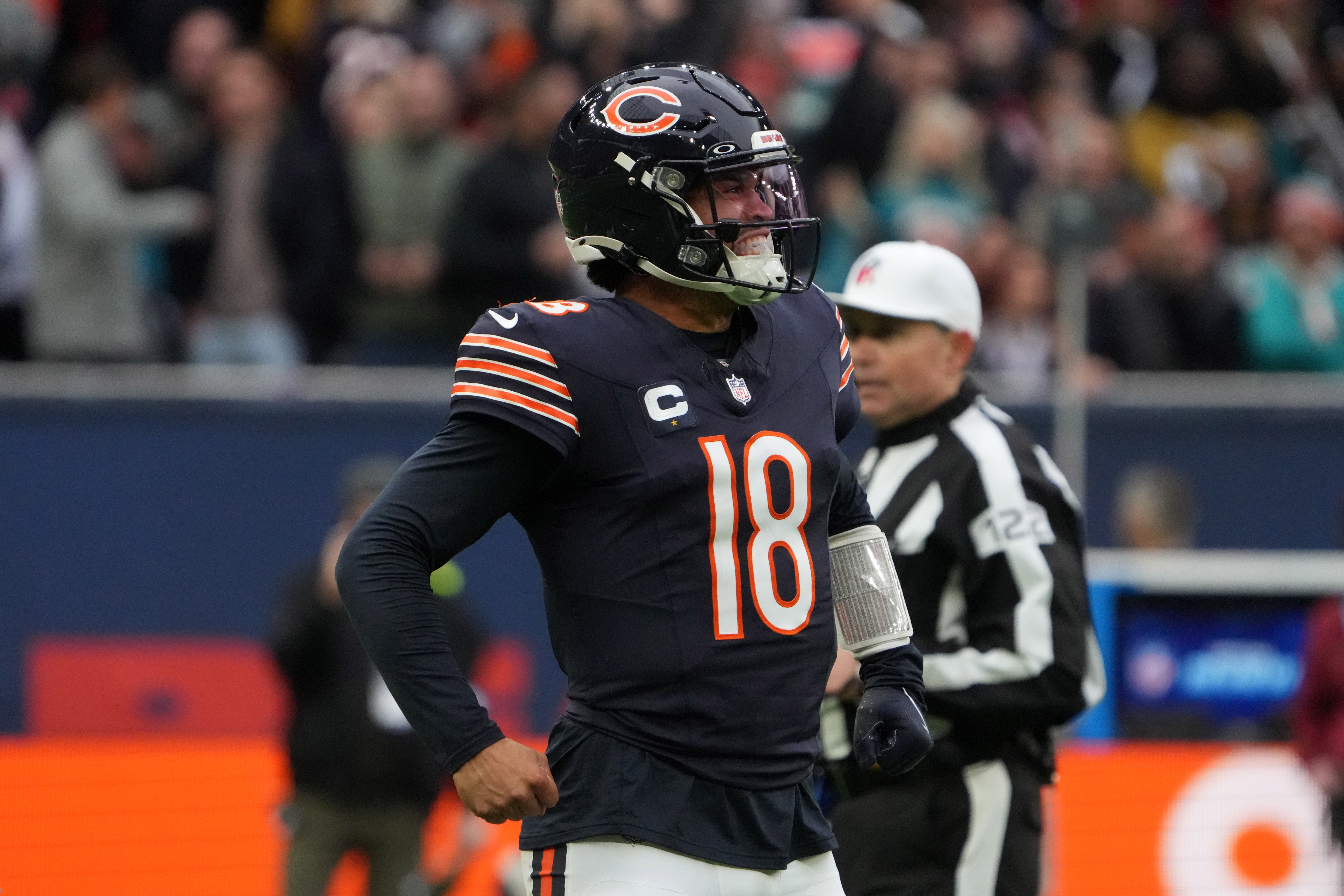 Oct 13, 2024; London, United Kingdom; Chicago Bears quarterback Caleb Williams (18) celebrates after a touchdown against the Jacksonville Jaguars in the second half during an NFL International Series game at Tottenham Hotspur Stadium.