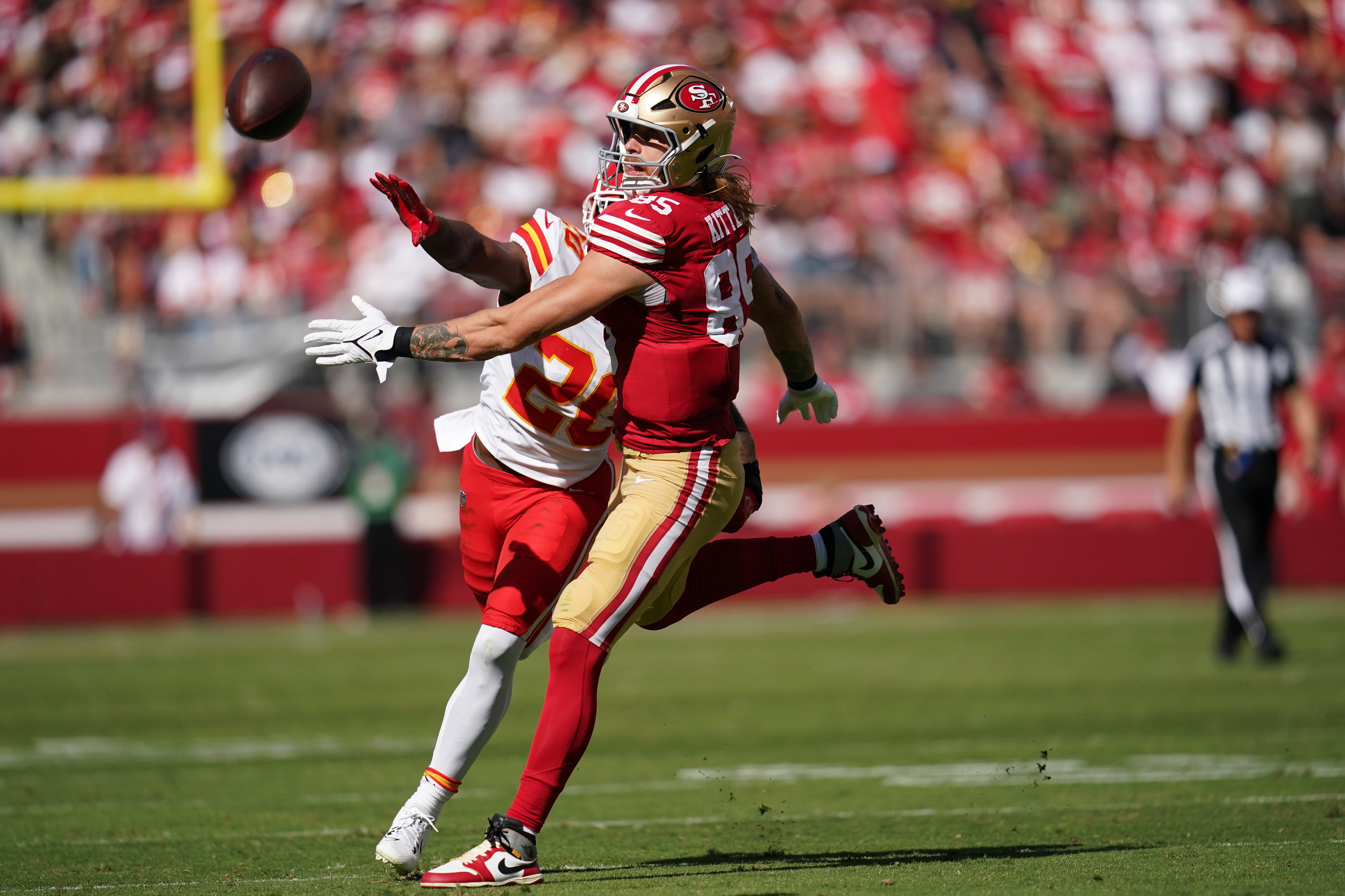 49ers tight end George Kittle is unable to make a catch next to Chiefs safety Justin Reid.