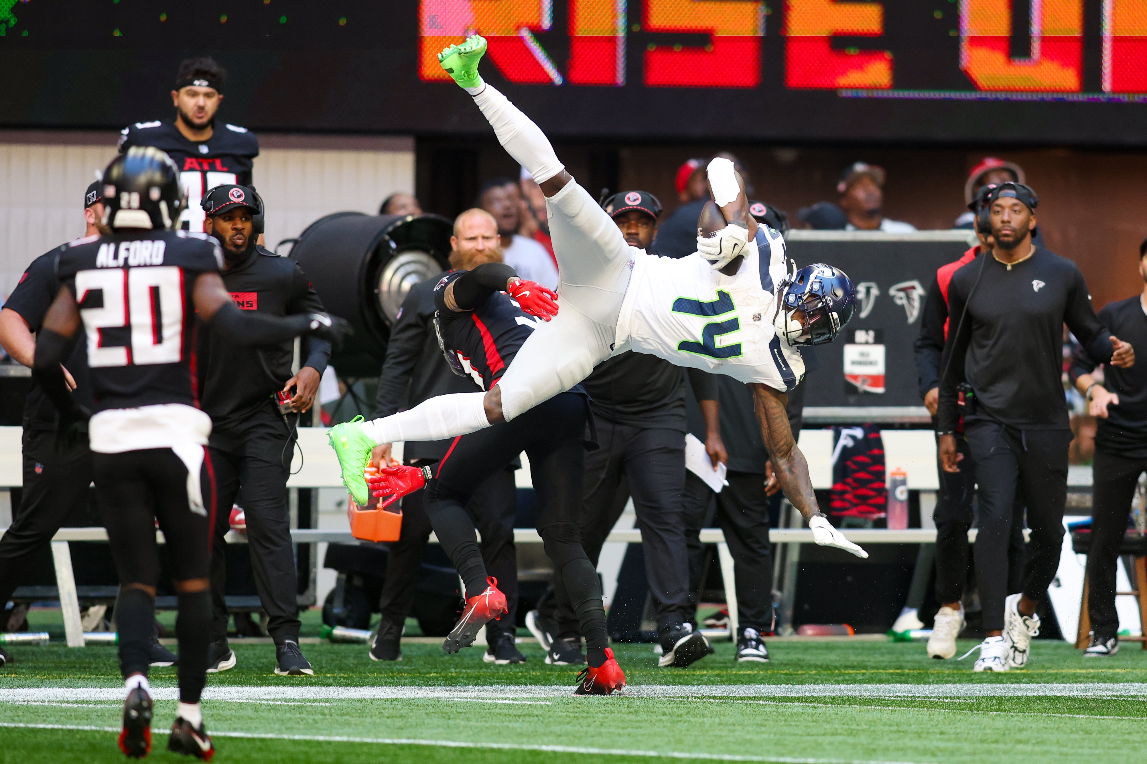 Atlanta Falcons safety Justin Simmons (31) breaks up a pass intended for Seattle Seahawks wide receiver DK Metcalf (14) in the third quarter at Mercedes-Benz Stadium.