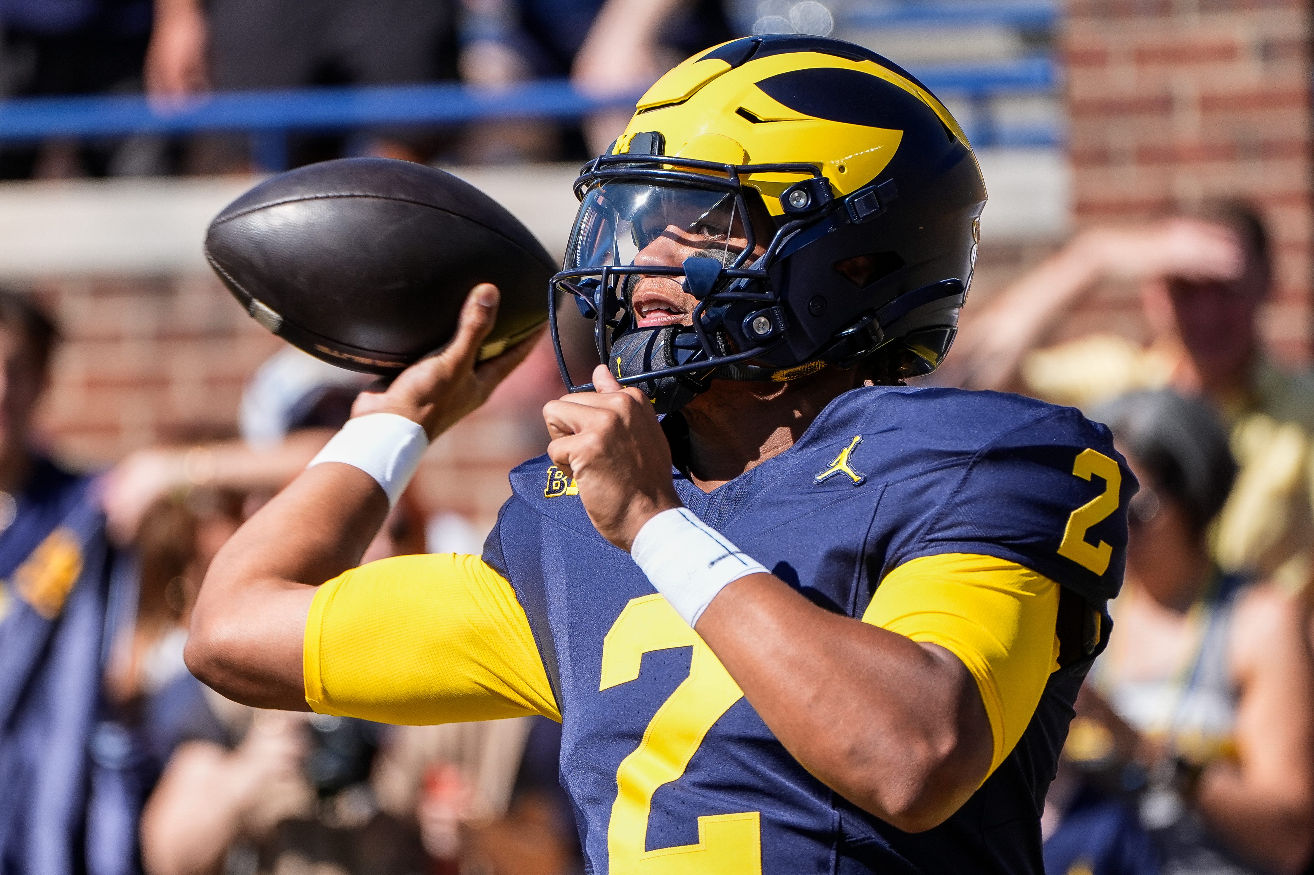 Michigan quarterback Jadyn Davis (2) warms up before the USC game at Michigan Stadium in Ann Arbor on Saturday, Sept. 21, 2024.
