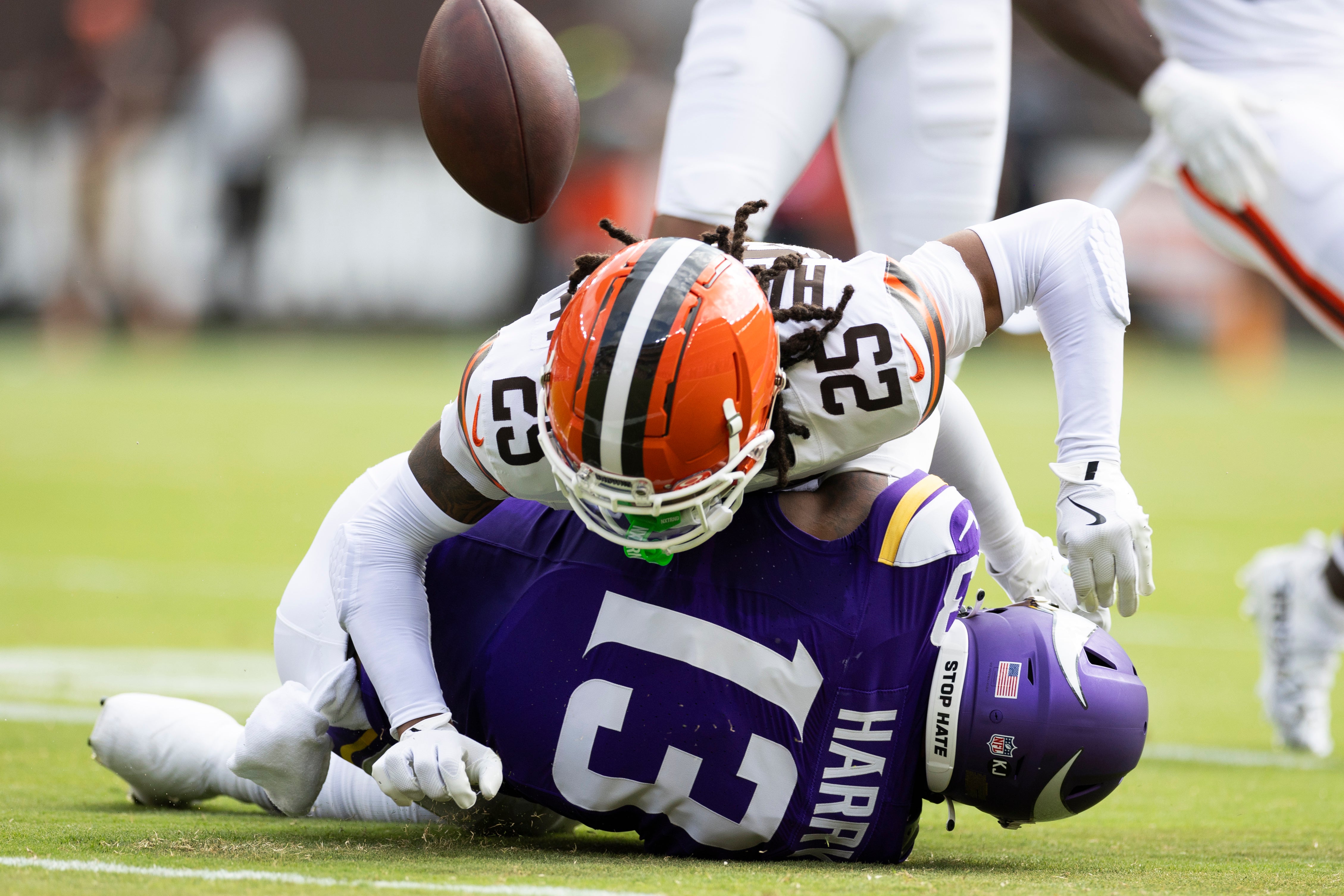 Aug 17, 2024; Cleveland, Ohio, USA; Cleveland Browns cornerback Kahlef Hailassie (25) tackles Minnesota Vikings wide receiver N'Keal Harry (13) breaking up the pass during the first quarter at Cleveland Browns Stadium.