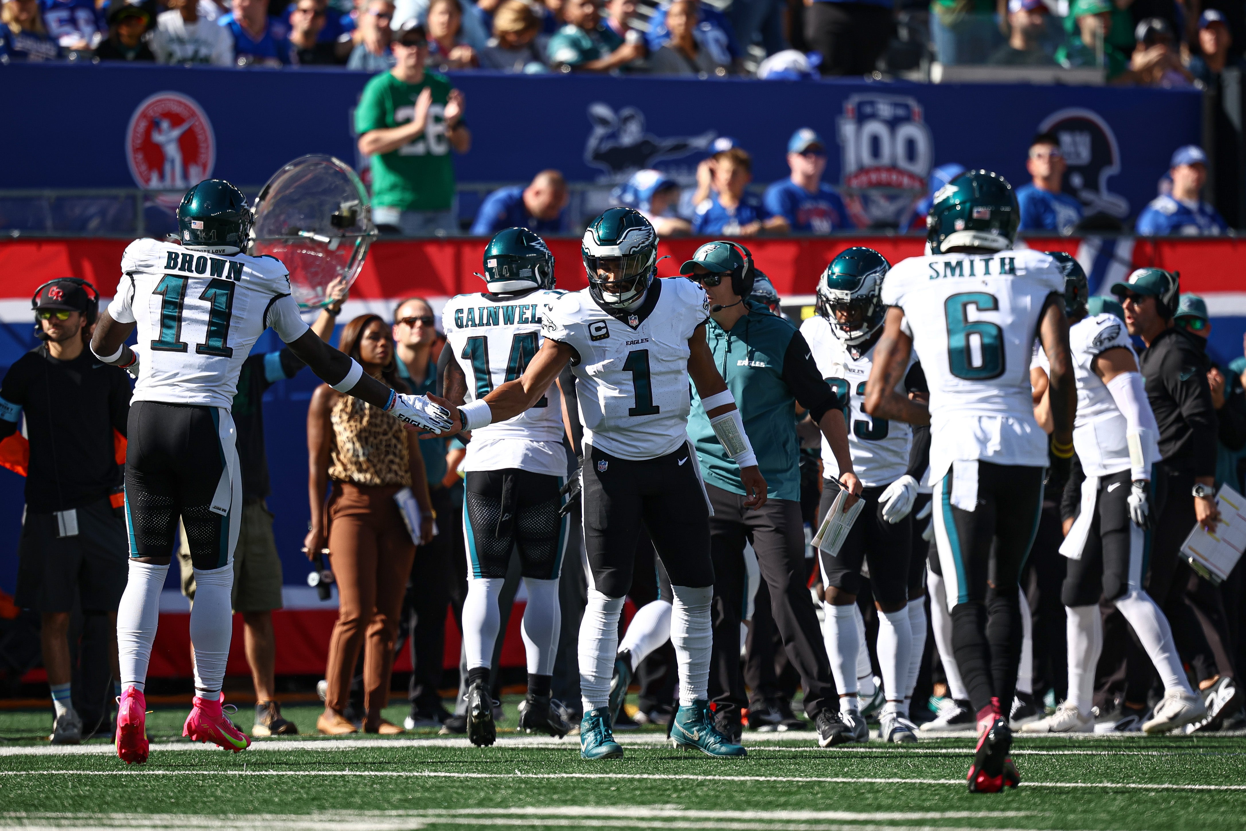 Eagles quarterback Jalen Hurts celebrates with teammates after a touchdown.