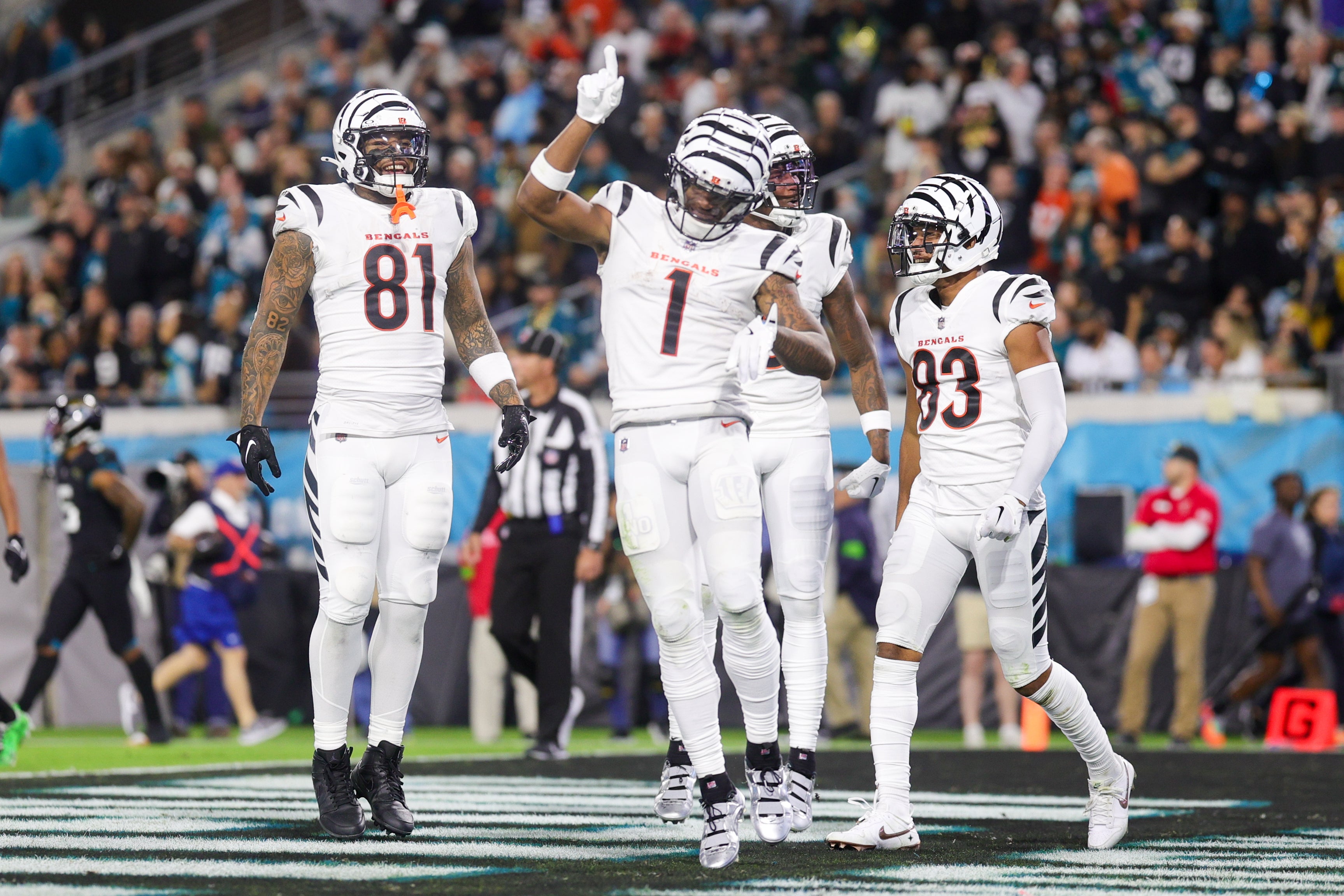 Dec 4, 2023; Jacksonville, Florida, USA; Cincinnati Bengals wide receiver Ja'Marr Chase (1) celebrates after scoring a touchdown against the Jacksonville Jaguars in the third quarter at EverBank Stadium.