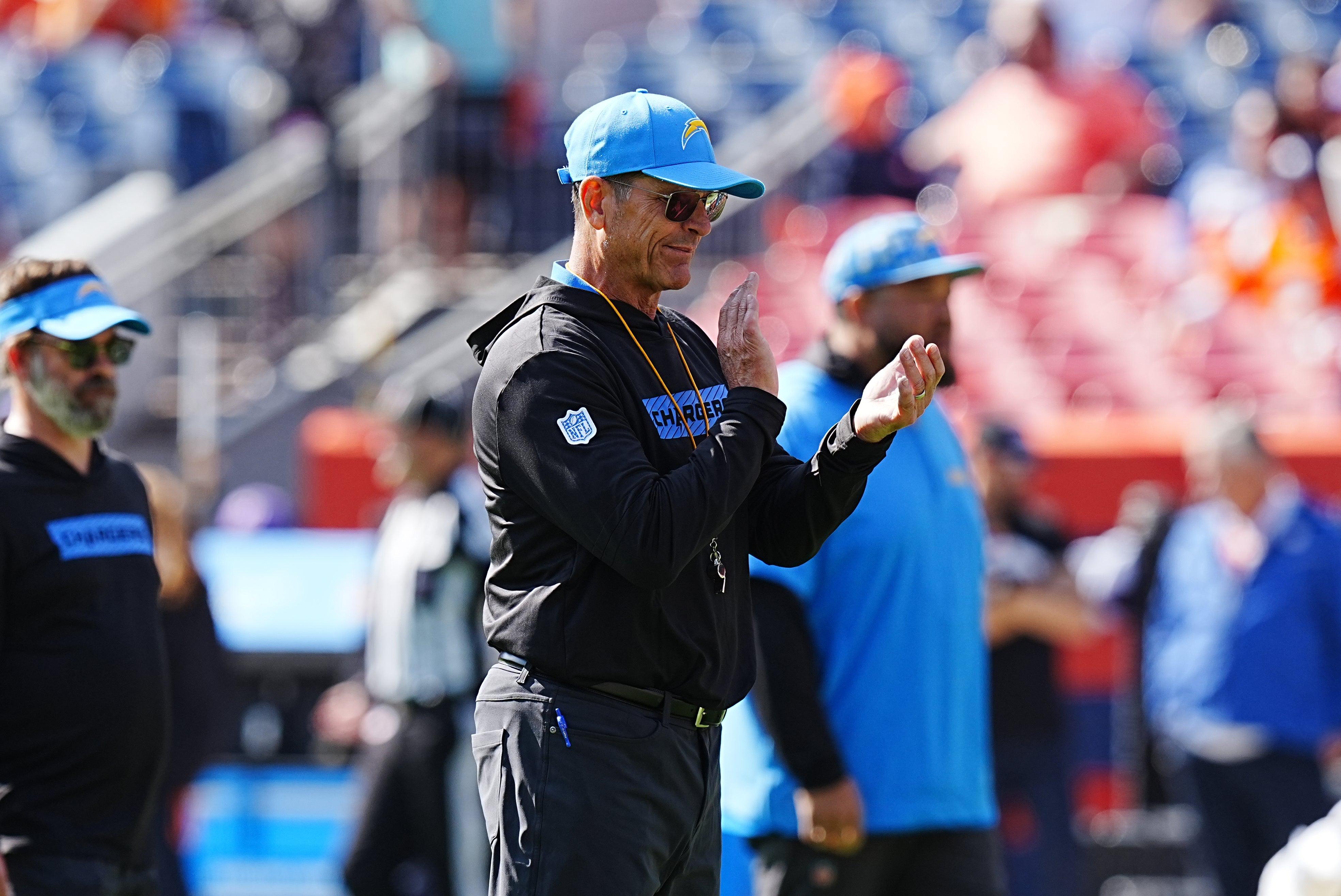 Los Angeles Chargers head coach Jim Harbaugh looks on before the game against the Denver Broncos at Empower Field at Mile High.
