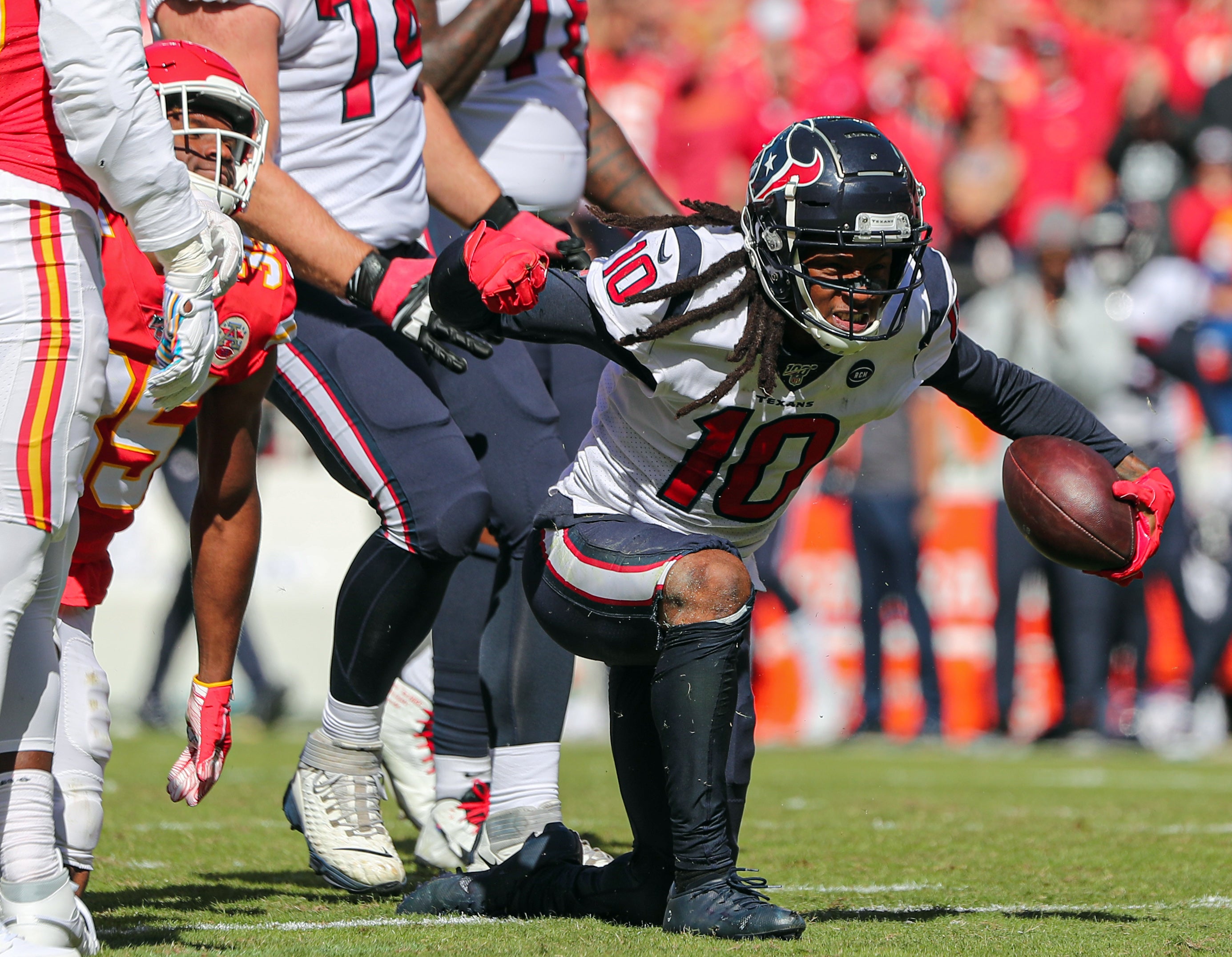 Oct 13, 2019; Kansas City, MO, USA; Houston Texans wide receiver DeAndre Hopkins (10) celebrates after a play against the Kansas City Chiefs during the first half at Arrowhead Stadium.