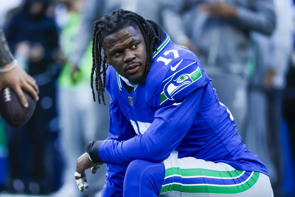 Seattle Seahawks linebacker Jerome Baker (17) takes a break during pregame warmups against the San Francisco 49ers at Lumen Field.