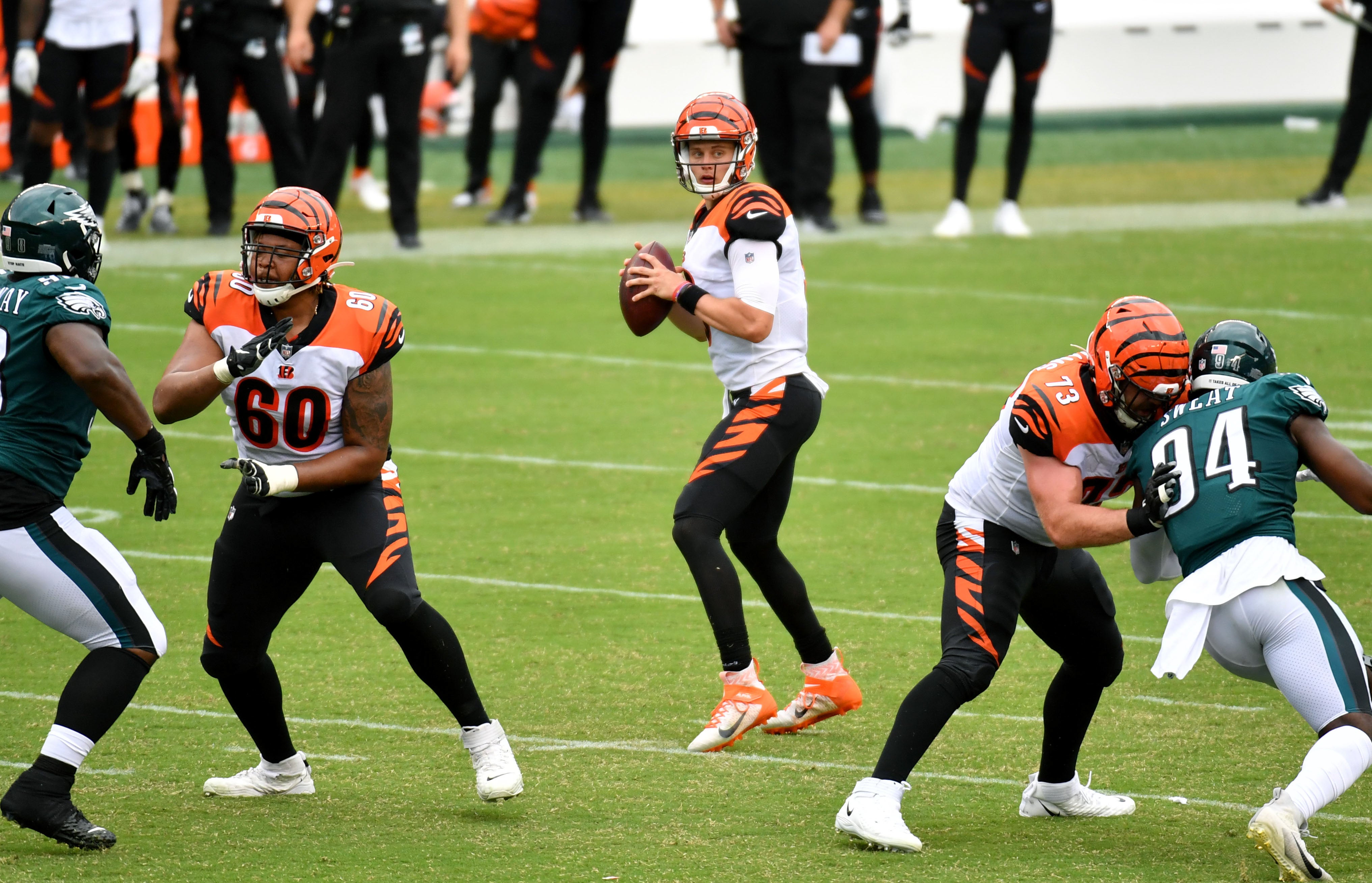 Sep 27, 2020; Philadelphia, Pennsylvania, USA; Cincinnati Bengals offensive guard Mike Jordan (60) and offensive tackle Jonah Williams (73) block for Cincinnati Bengals quarterback Joe Burrow (9) against the Philadelphia Eagles during the fourth quarter at Lincoln Financial Field.
