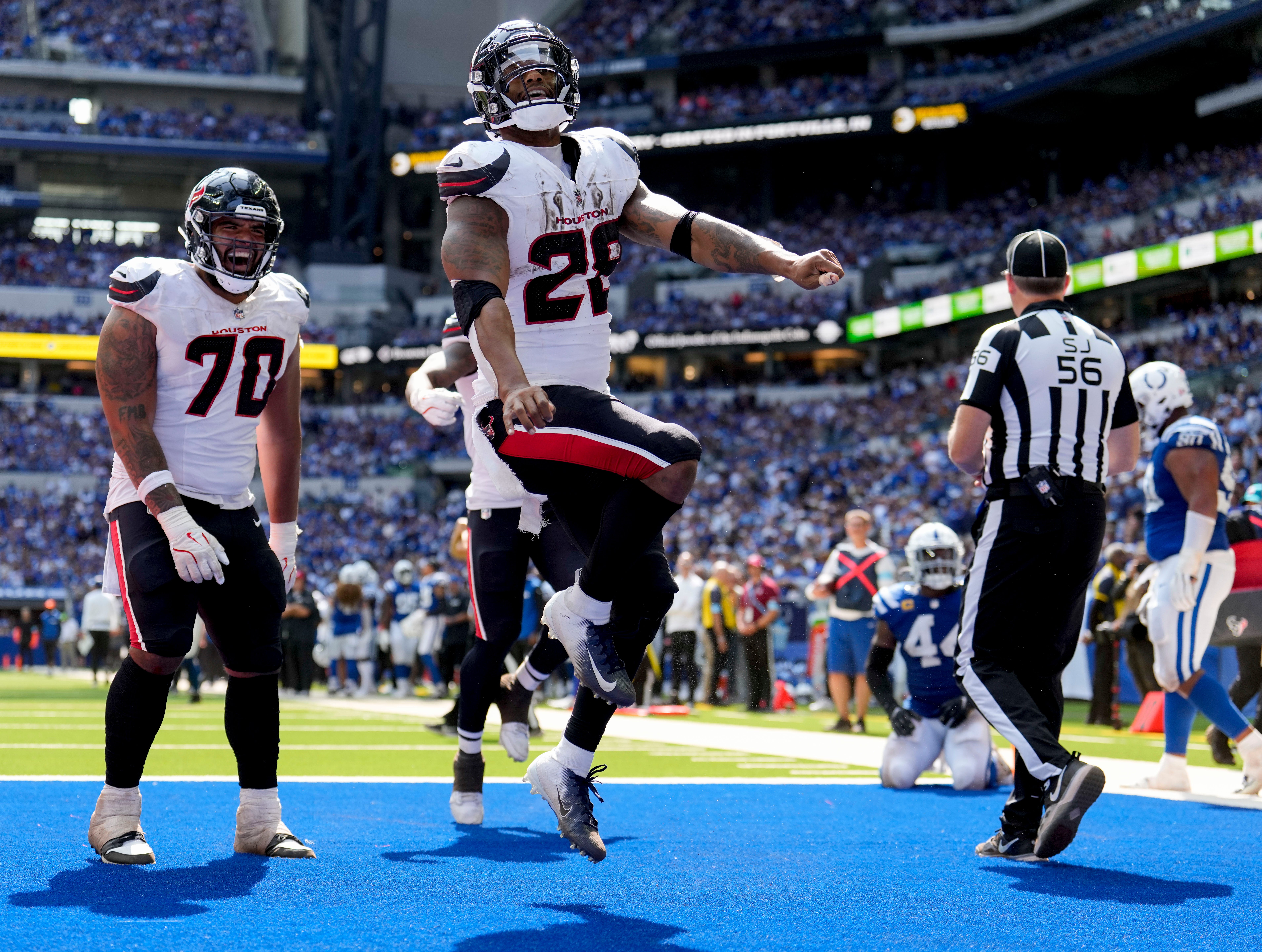 Houston Texans running back Joe Mixon (28) celebrates after scoring a touchdown Sunday, Sept. 8, 2024, during a game against the Indianapolis Colts at Lucas Oil Stadium in Indianapolis.