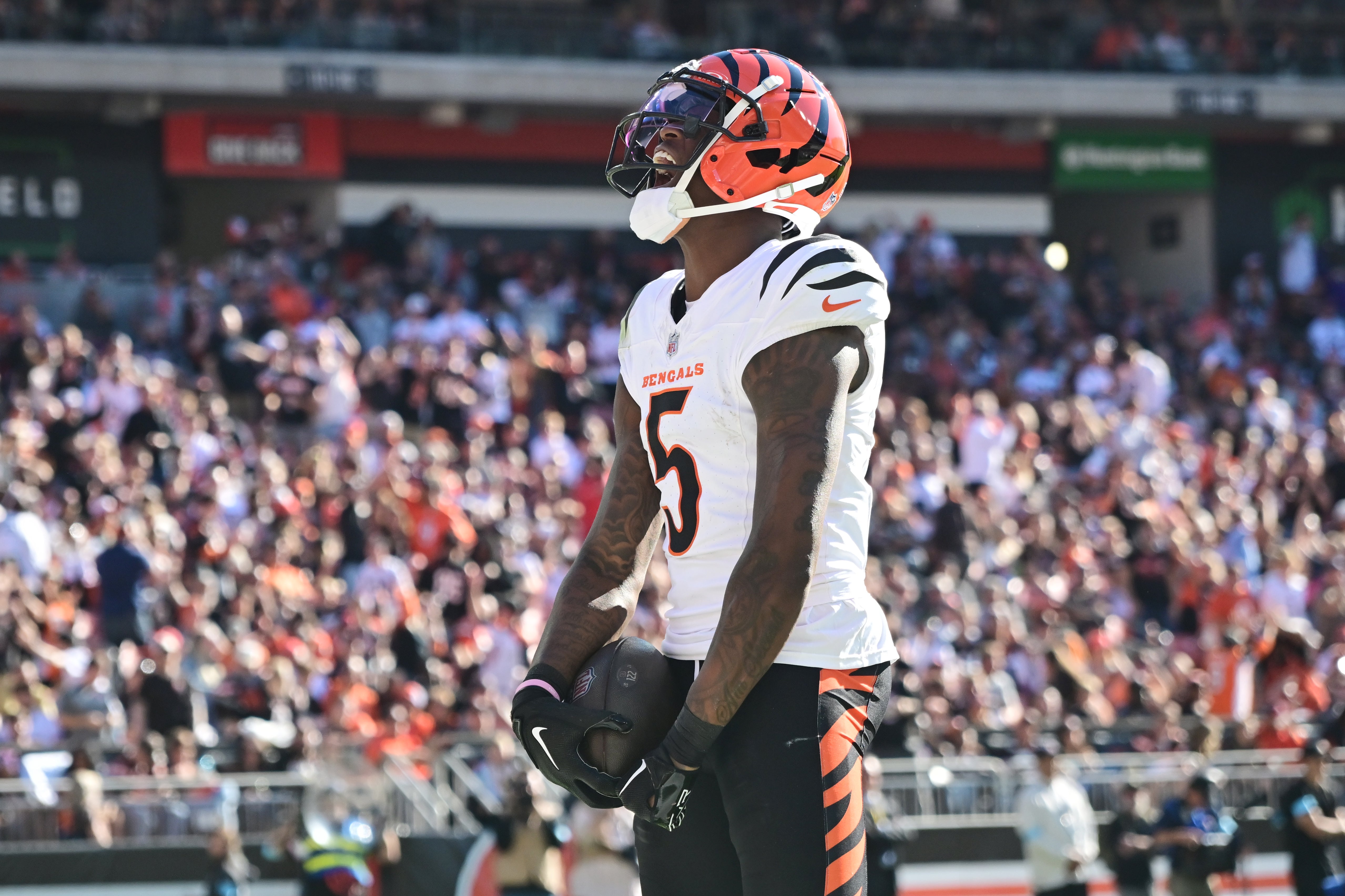 Oct 20, 2024; Cleveland, Ohio, USA; Cincinnati Bengals wide receiver Tee Higgins (5) celebrates after scoring a touchdown during the second half against the Cleveland Browns at Huntington Bank Field. 