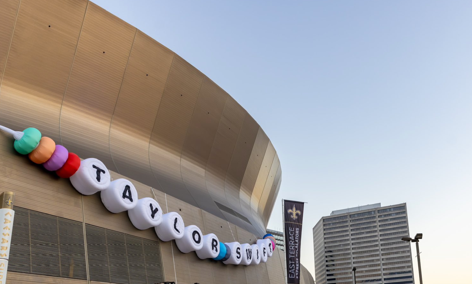 Caesars Superdome hangs a massive friendship to welcome Taylor Swift ahead of her Eras Tour shows this weekend