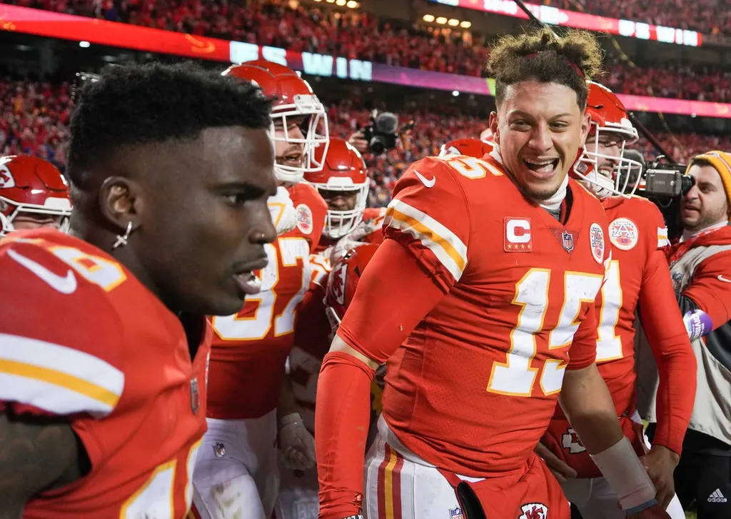 Kansas City Chiefs quarterback Patrick Mahomes (15) celebrates with wide receiver Tyreek Hill (10) after the win over the Buffalo Bills during an AFC Divisional playoff football game at GEHA Field