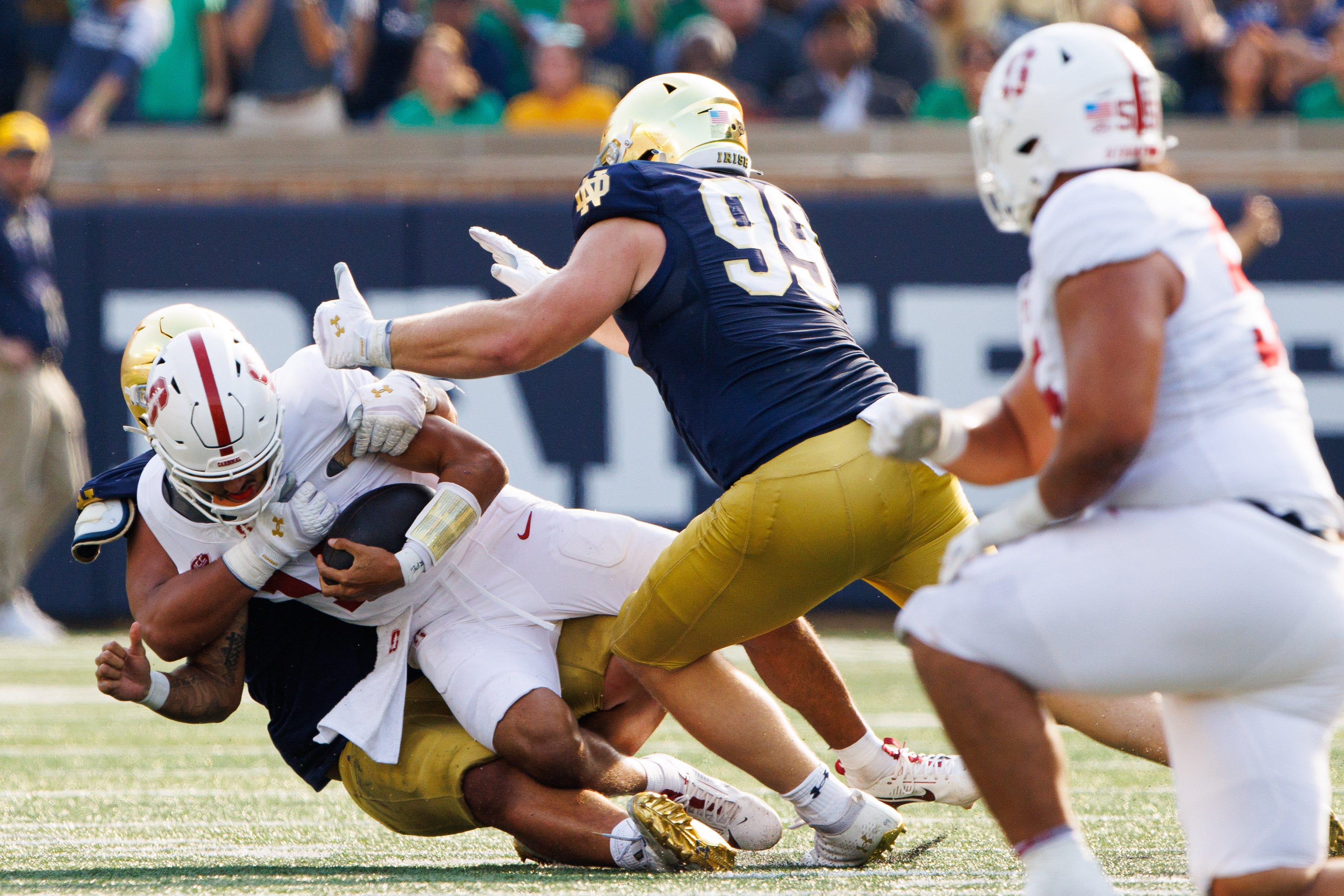 Notre Dame defensive lineman Howard Cross III sacks Stanford quarterback Ashton Daniels during a NCAA college football game between Notre Dame and Stanford at Notre Dame Stadium on Saturday, Oct. 12, 2024, in South Bend.