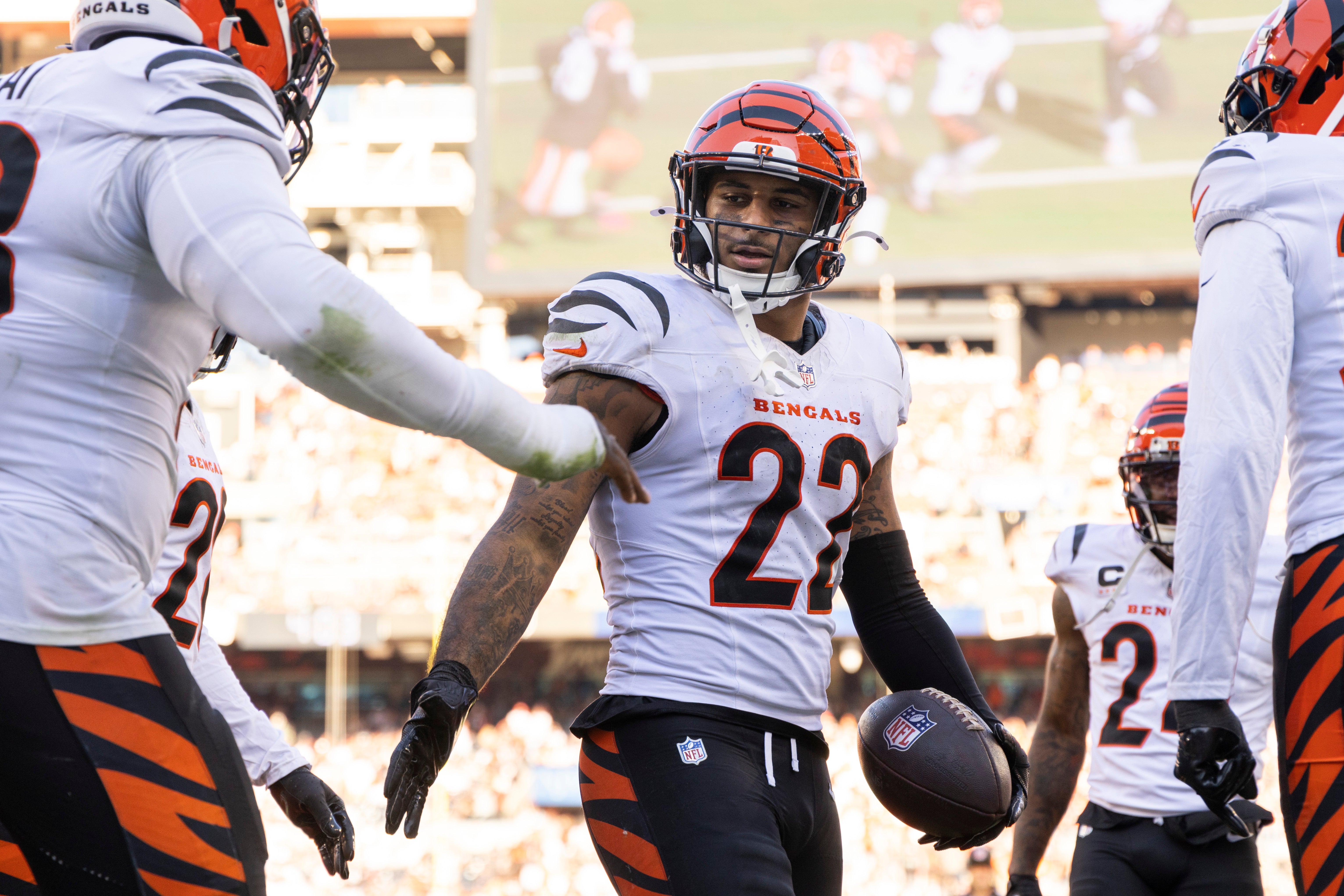 Oct 20, 2024; Cleveland, Ohio, USA; Cincinnati Bengals safety Geno Stone (22) and teammates celebrate his interception during the fourth quarter against the Cleveland Browns at Huntington Bank Field.
