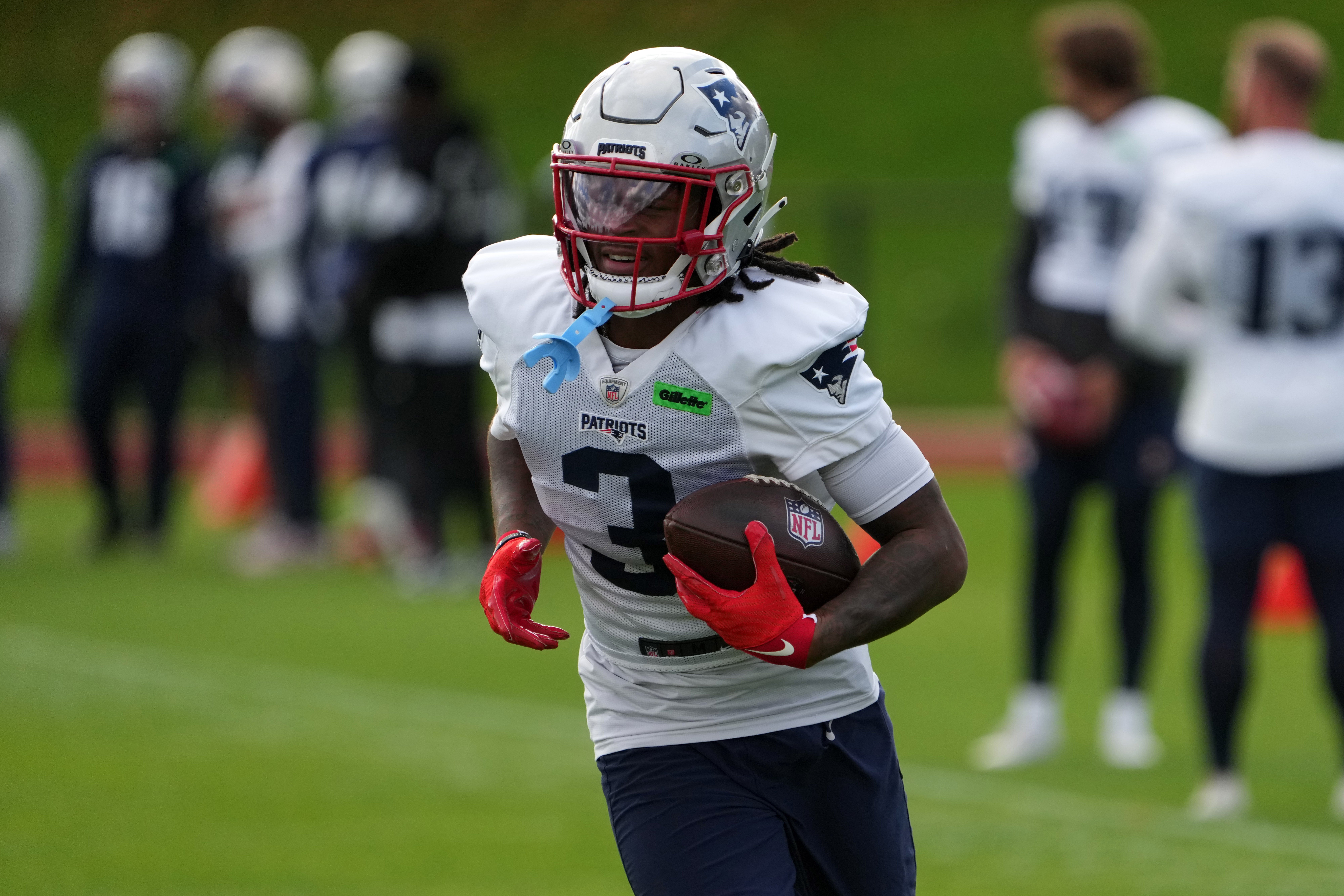 Oct 18, 2024; London, United Kingdom; New England Patriots wide receiver DeMario Douglas (3) carries the ball during practice at the Harrow School.