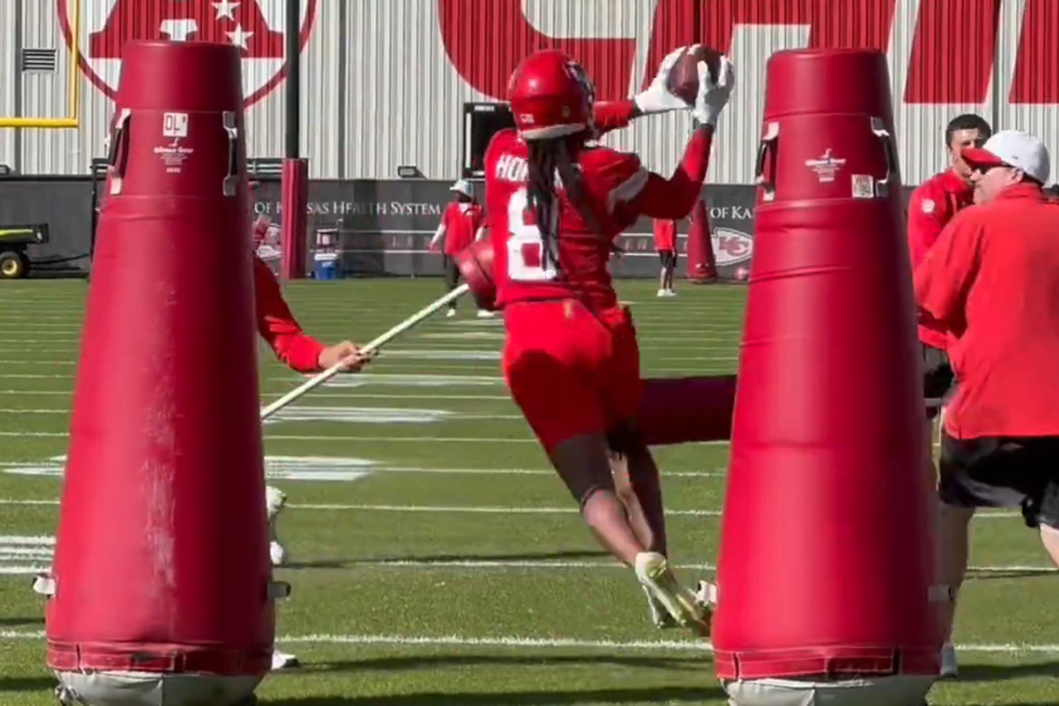 Chiefs WR DeAndre Hopkins catches a pass during practice on Thursday.