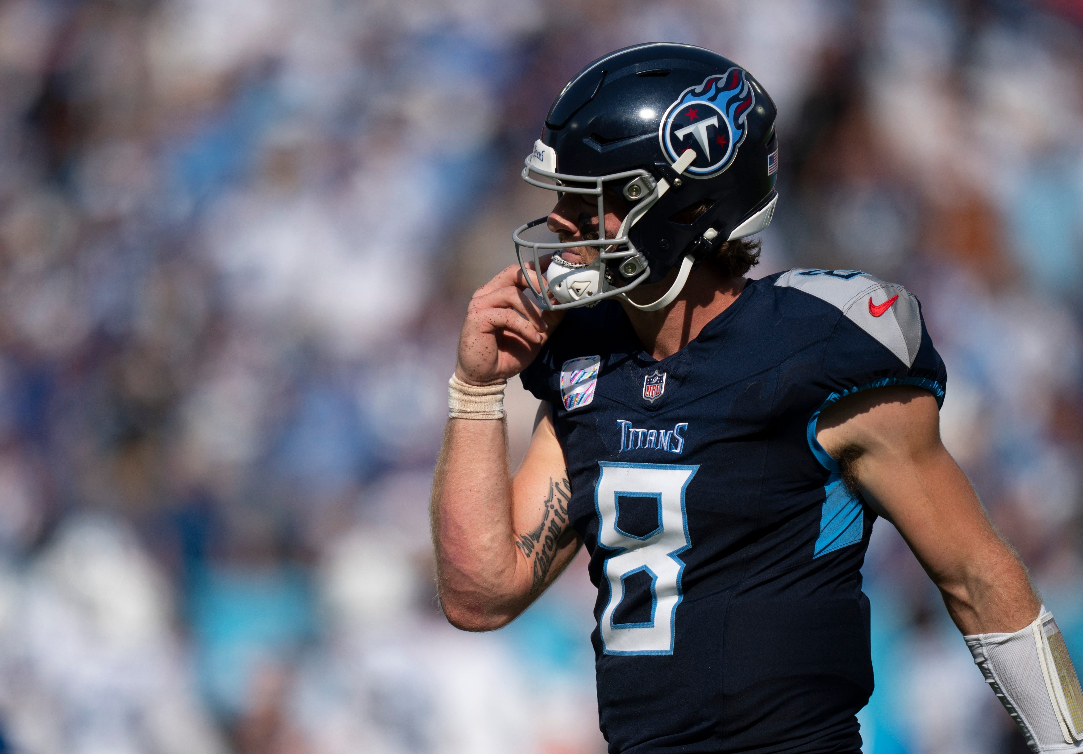 Tennessee Titans quarterback Will Levis (8) heads off the field after throwing a fourth quarter interception against the Indianapolis Colts during their game at Nissan Stadium in Nashville, Tenn., Monday, Oct. 14, 2024.