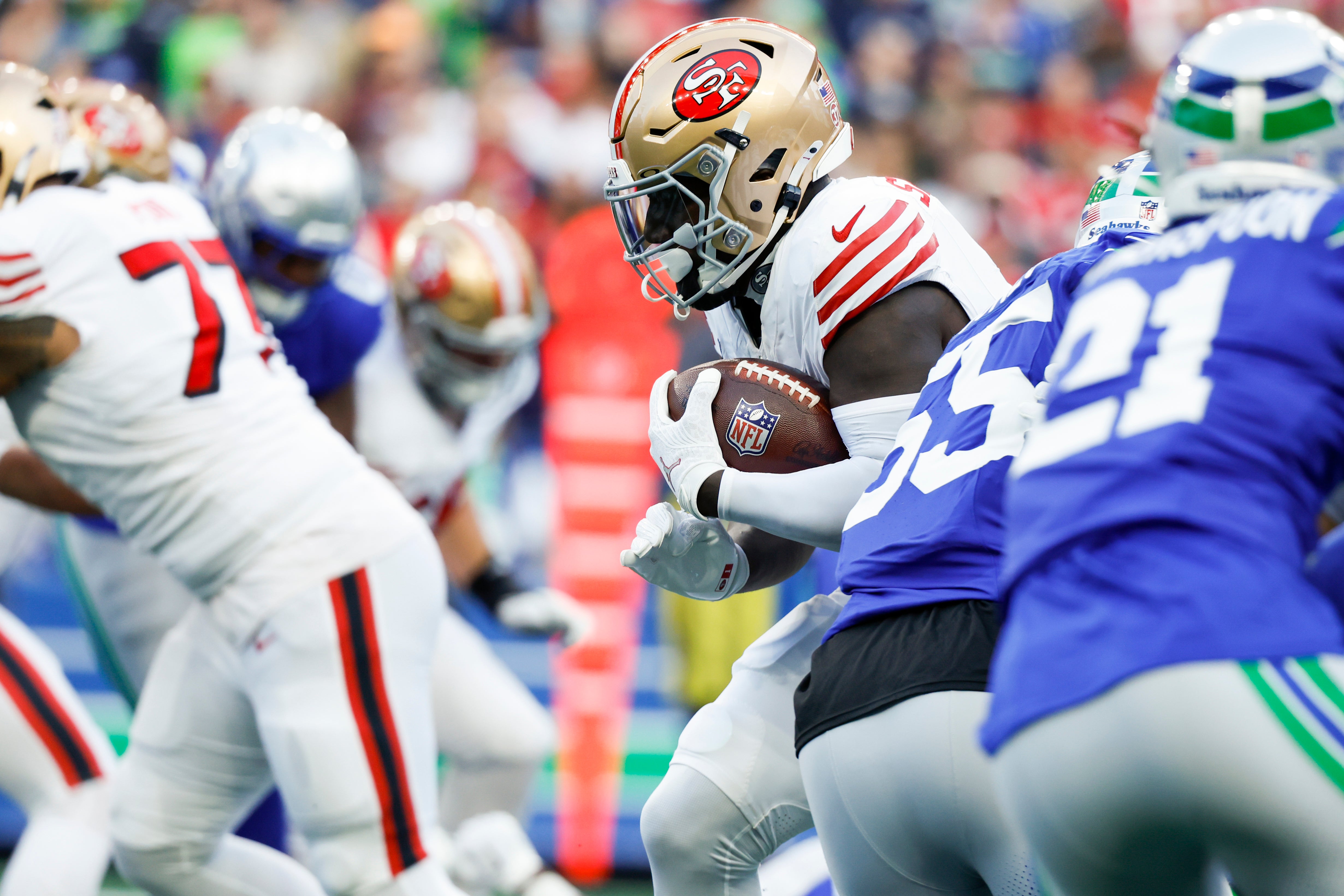 San Francisco 49ers wide receiver Deebo Samuel Sr. (1) rushes against the Seattle Seahawks during the first quarter at Lumen Field.