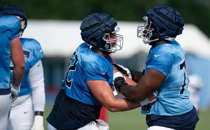 Tennessee Titans offensive center/guard Corey Levin (62) and offensive lineman Nicholas Petit-Frere go through drills during training camp at Ascension Saint Thomas Sports Park in Nashville, Tenn., Saturday, Aug. 3, 2024.