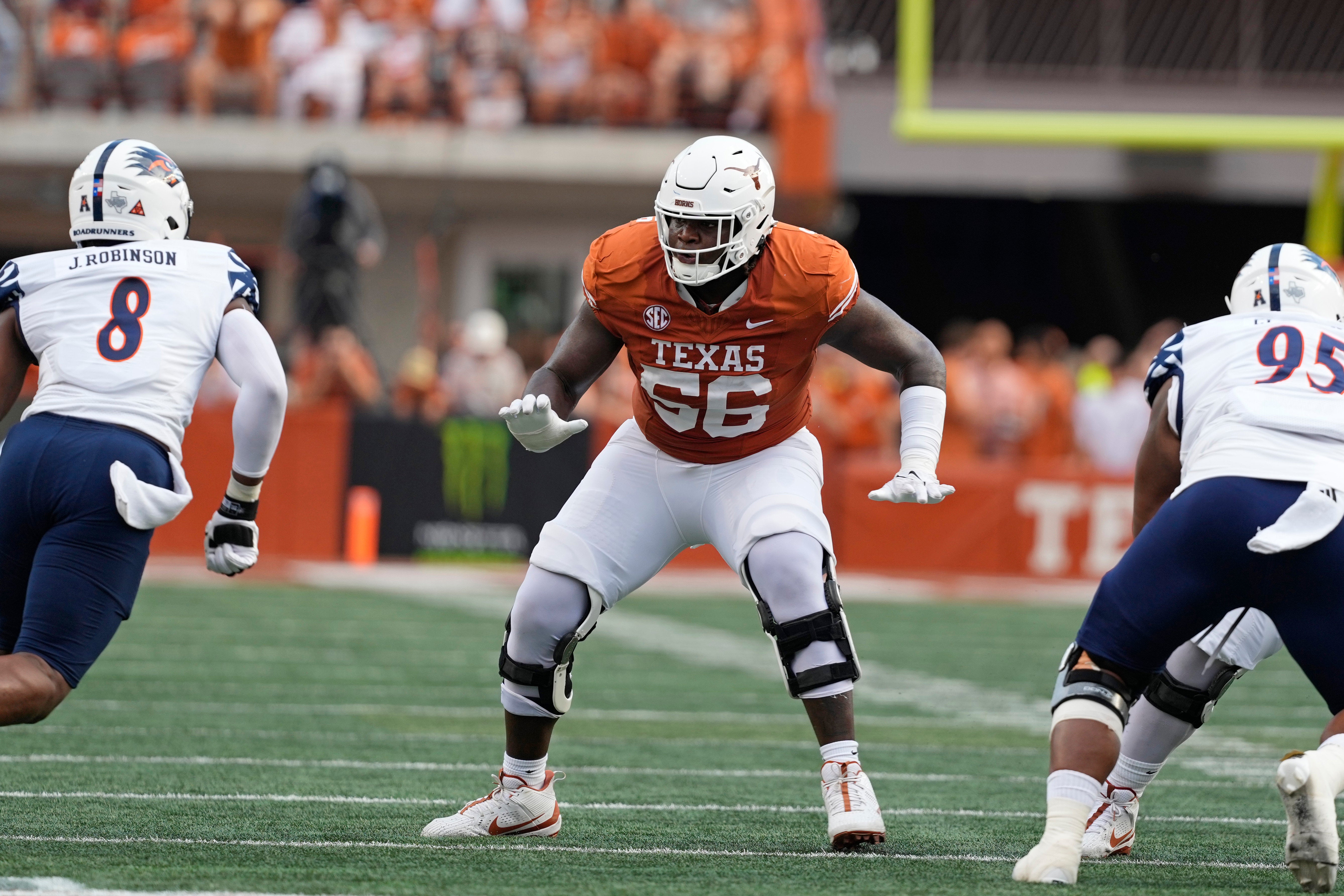 Texas Longhorns offensive lineman Cameron Williams (56) blocks during the first half against the Texas-San Antonio Roadrunners at Texas at Darrell K Royal-Texas Memorial Stadium.