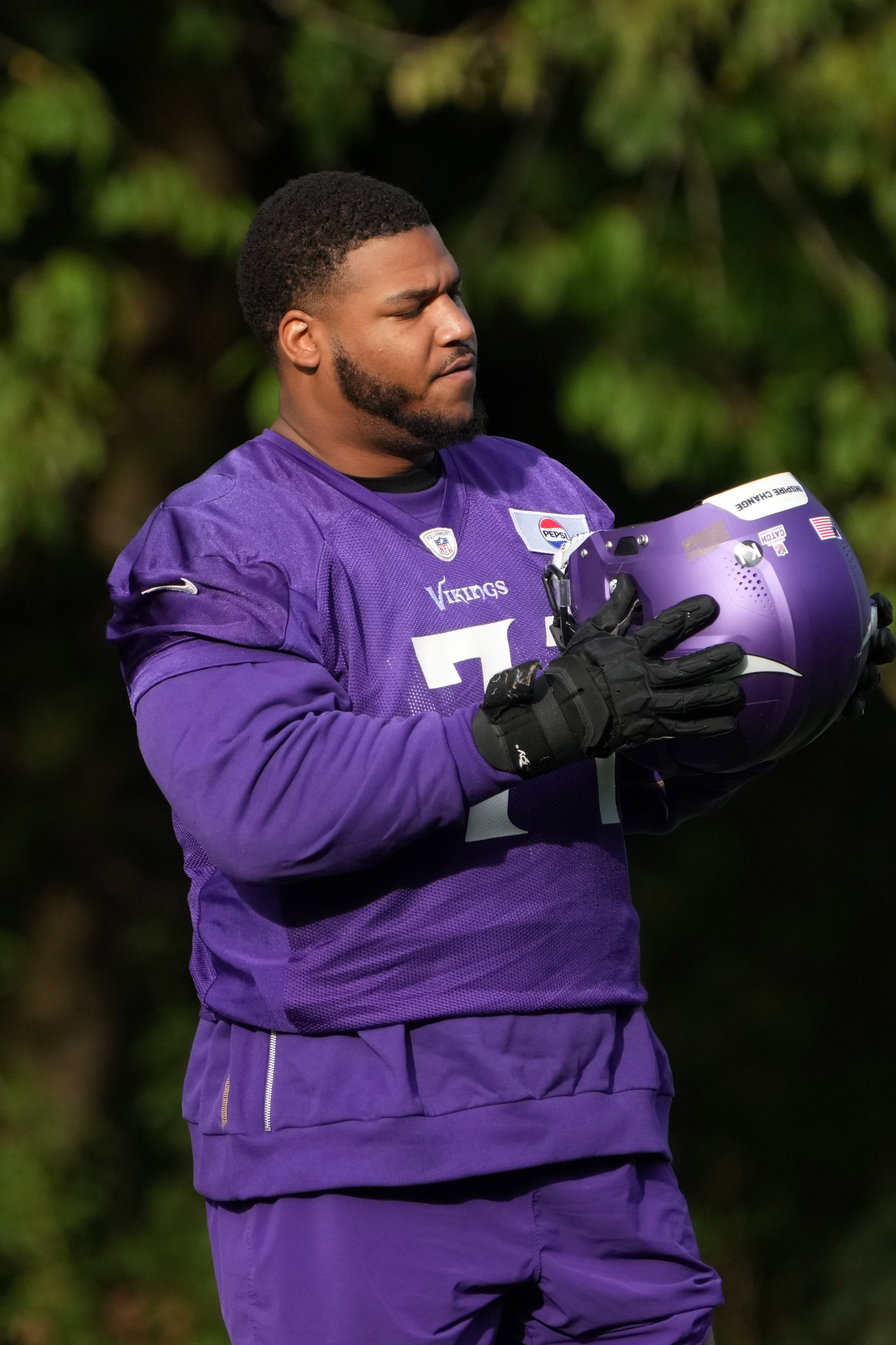 Minnesota Vikings offensive tackle Christian Darrisaw (71) during practice at The Grove.
