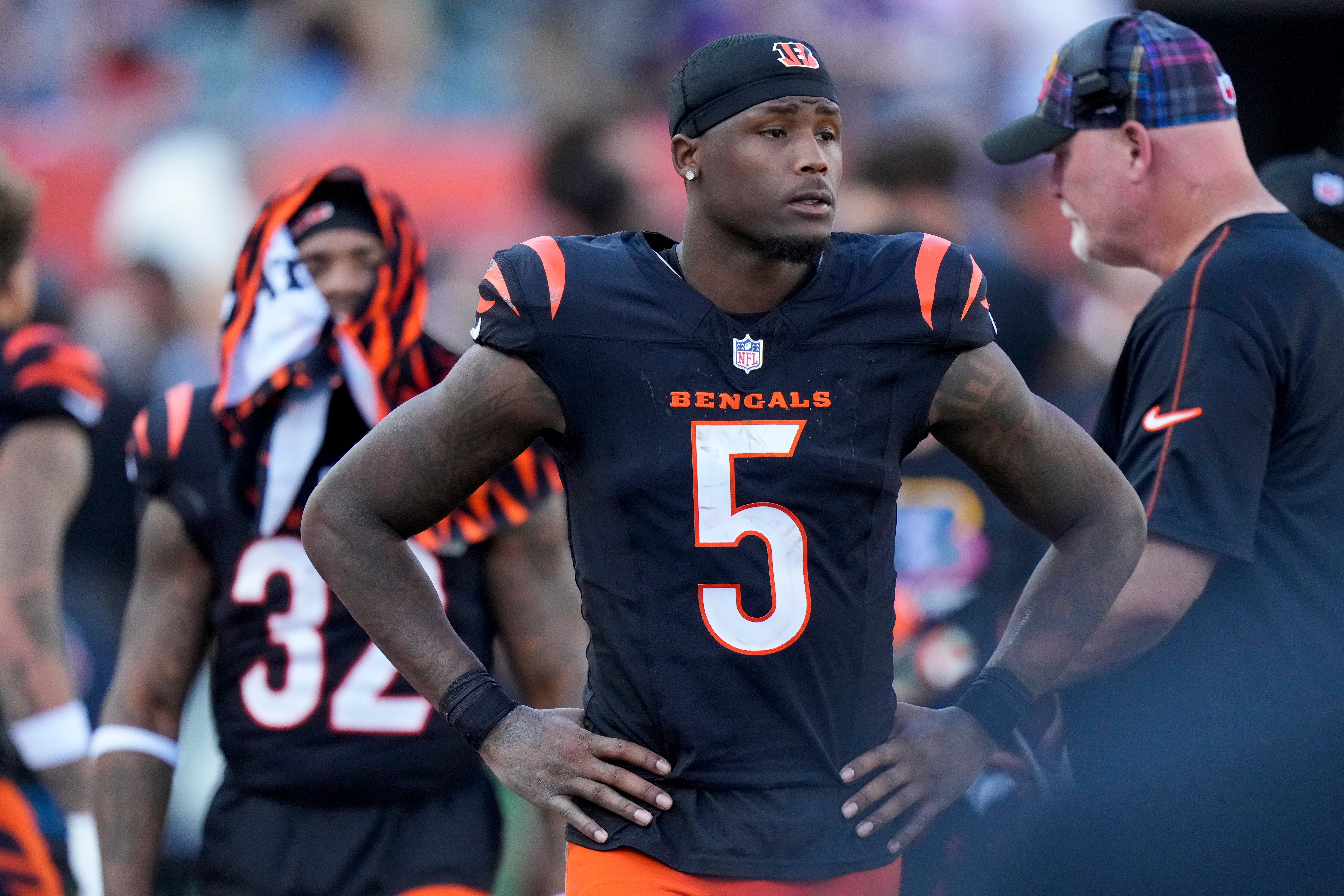 Cincinnati Bengals wide receiver Tee Higgins (5) walks the sideline as the Ravens drive to a win in overtime of the NFL Week 5 game between the Cincinnati Bengals and Baltimore Ravens at Paycor Stadium in downtown Cincinnati on Sunday, Oct. 6, 2024. The Bengals fell to 1-4 on the season with a 41-38 loss to the Ravens.