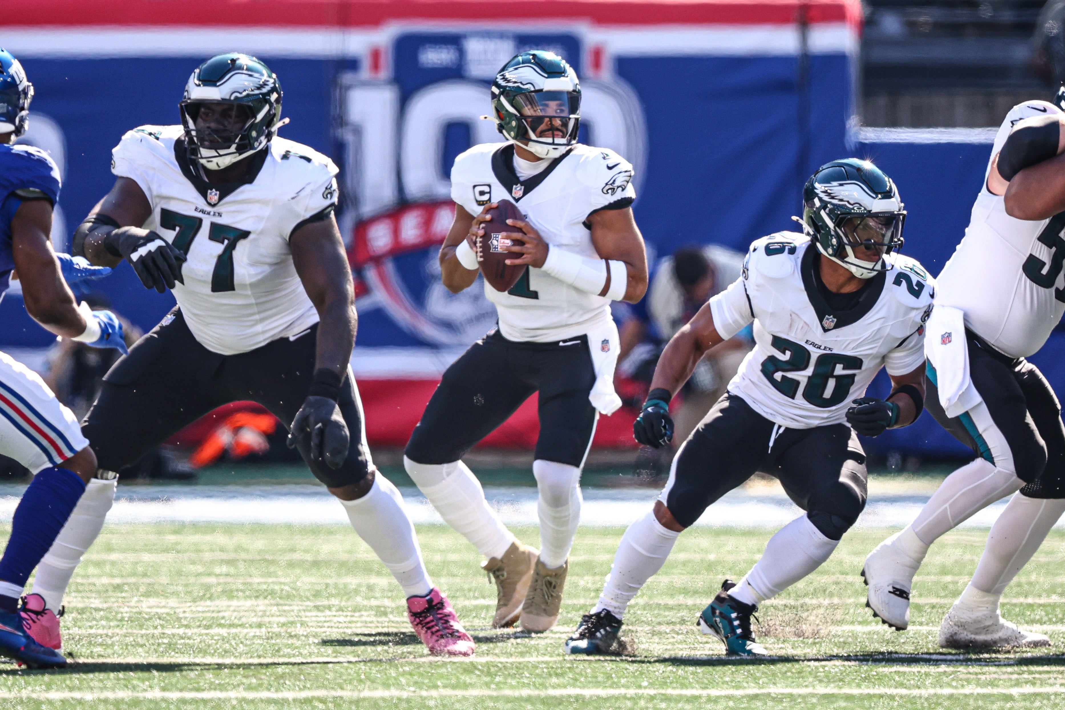 Philadelphia Eagles quarterback Jalen Hurts (1) drops back to pass during the first half against the New York Giants at MetLife Stadium.