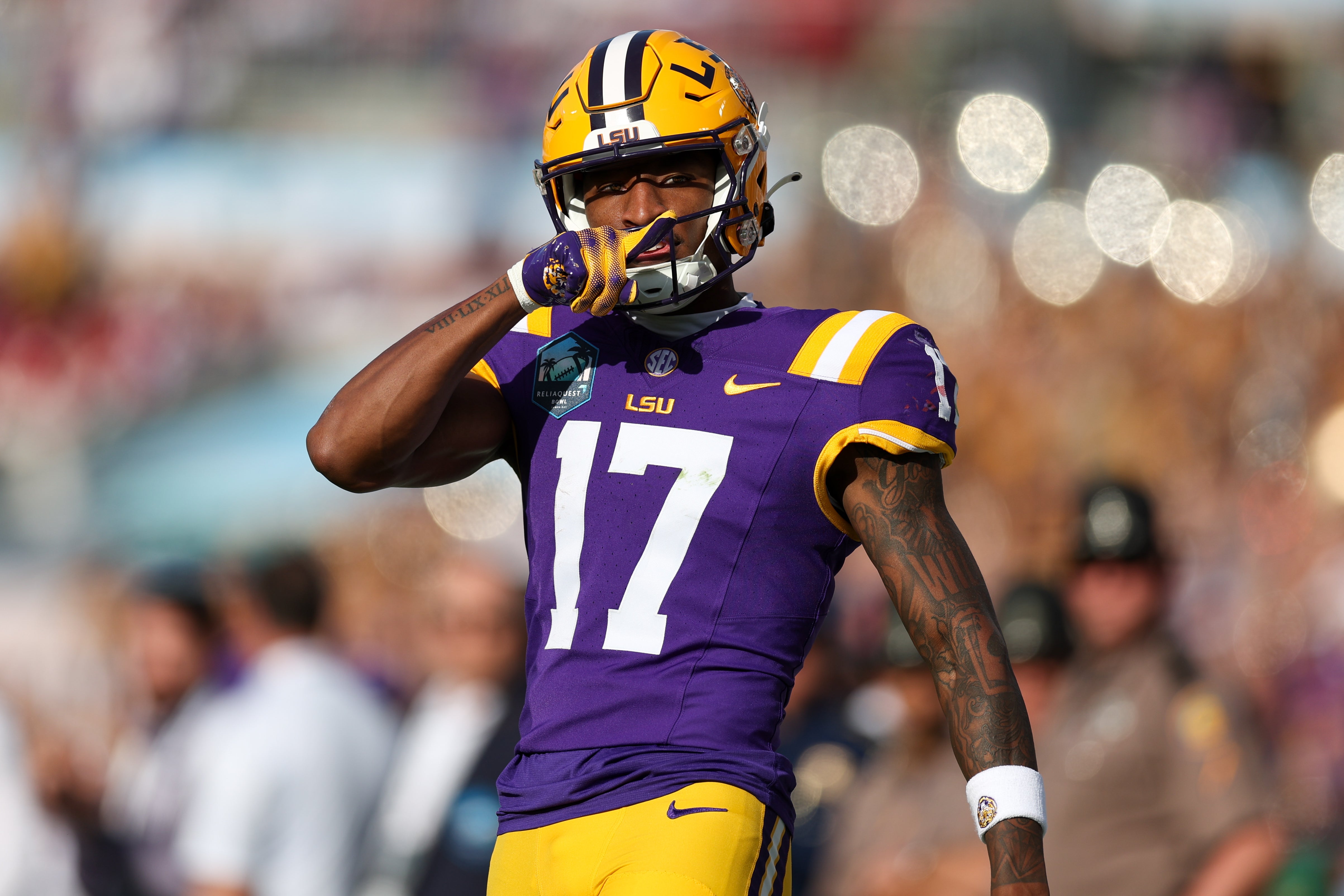 Jan 1, 2024; Tampa, FL, USA; LSU Tigers wide receiver Chris Hilton Jr. (17) reacts after catching a pass against the Wisconsin Badgers in the fourth quarter during the ReliaQuest Bowl at Raymond James Stadium.
