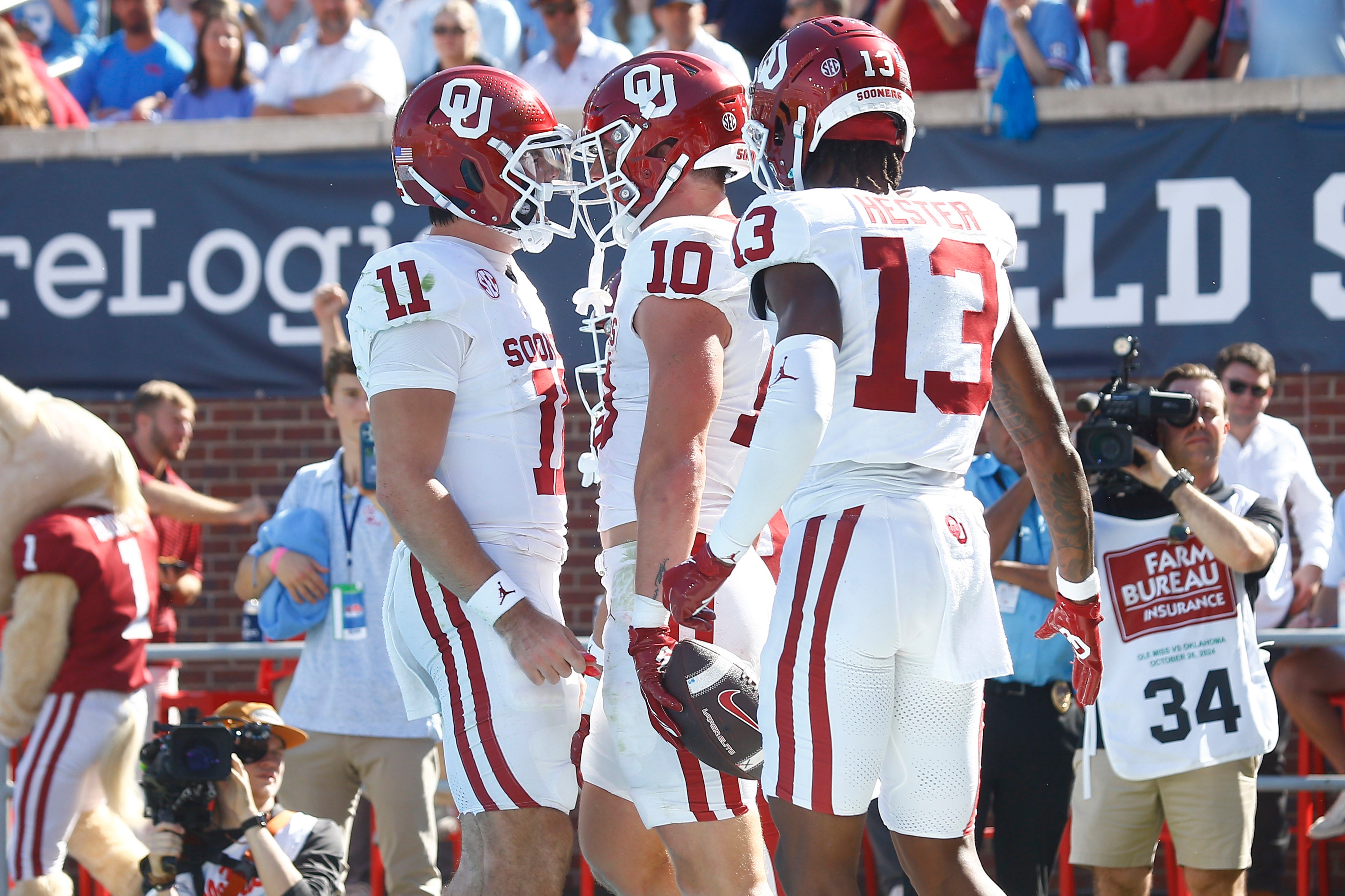 Oct 26, 2024; Oxford, Mississippi, USA; Oklahoma Sooners quarterback Jackson Arnold (11) reacts with tight end Bauer Sharp (10) after a touchdown during the first half against the Mississippi Rebels at Vaught-Hemingway Stadium.