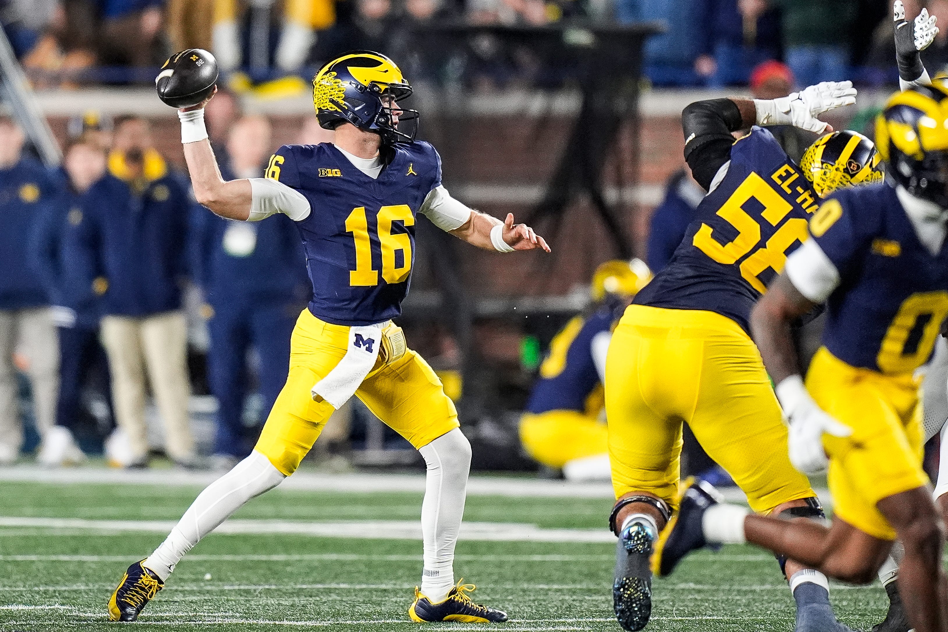Michigan quarterback Davis Warren (16) makes a pass against Michigan State during the first half at Michigan Stadium in Ann Arbor on Saturday, Oct. 26, 2024.