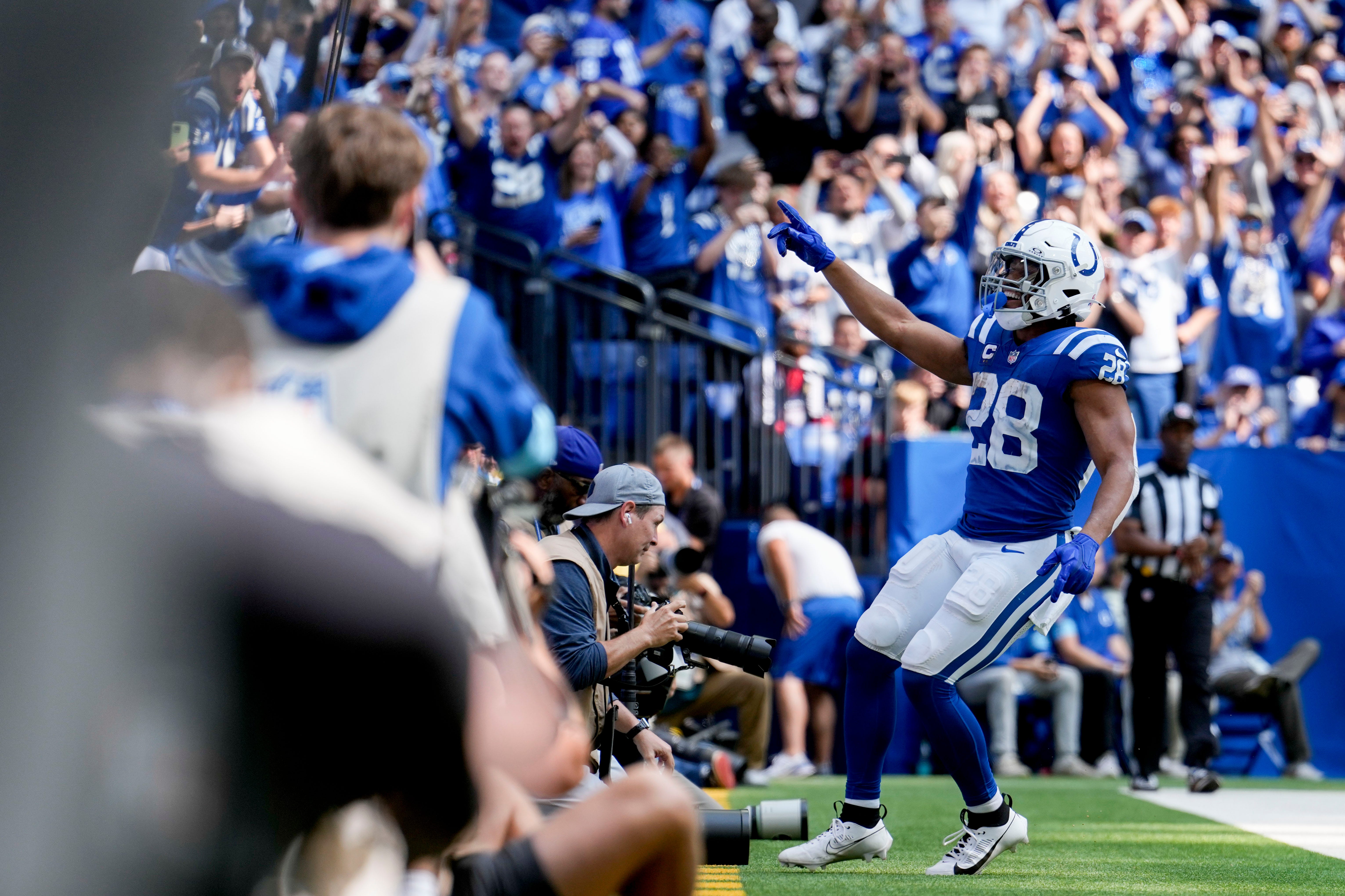 Indianapolis Colts running back Jonathan Taylor (28) celebrates as he runs in for a touchdown Sunday, Sept. 8, 2024, during a game against the Houston Texans at Lucas Oil Stadium in Indianapolis.