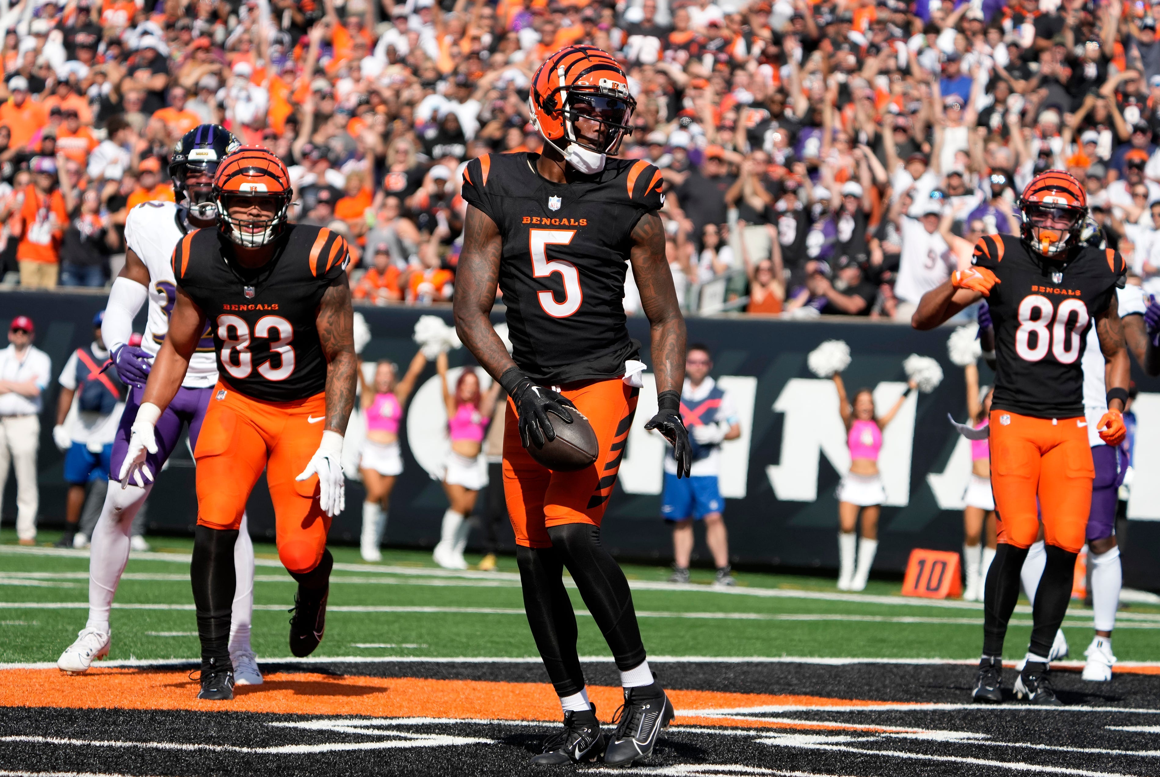 Cincinnati Bengals wide receiver Tee Higgins (5) makes a touchdown over the Baltimore Ravens in the 3rd quarter Sunday October 6, 2024 at Payor Stadium. The Bengals lost 41-38 in overtime.