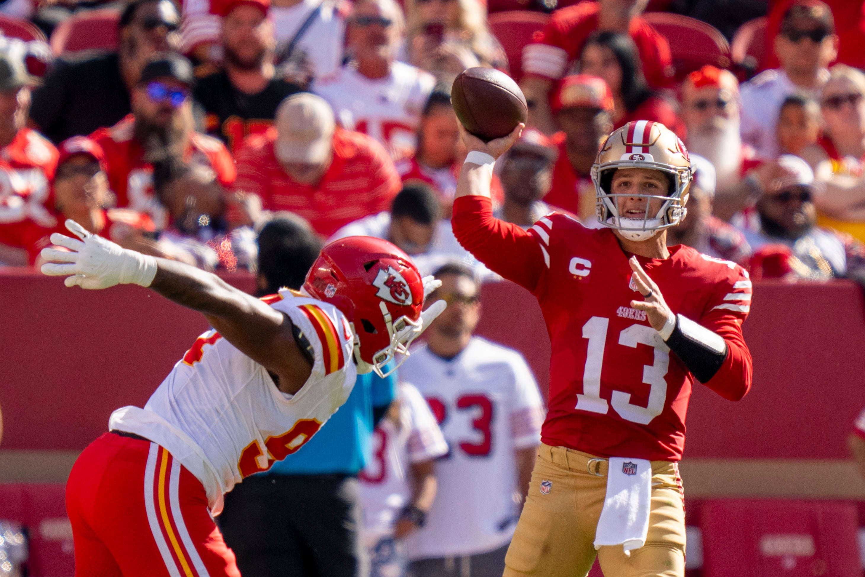 San Francisco 49ers quarterback Brock Purdy (13) passes the football against Kansas City Chiefs defensive end Malik Herring (94) during the second quarter at Levi's Stadium.