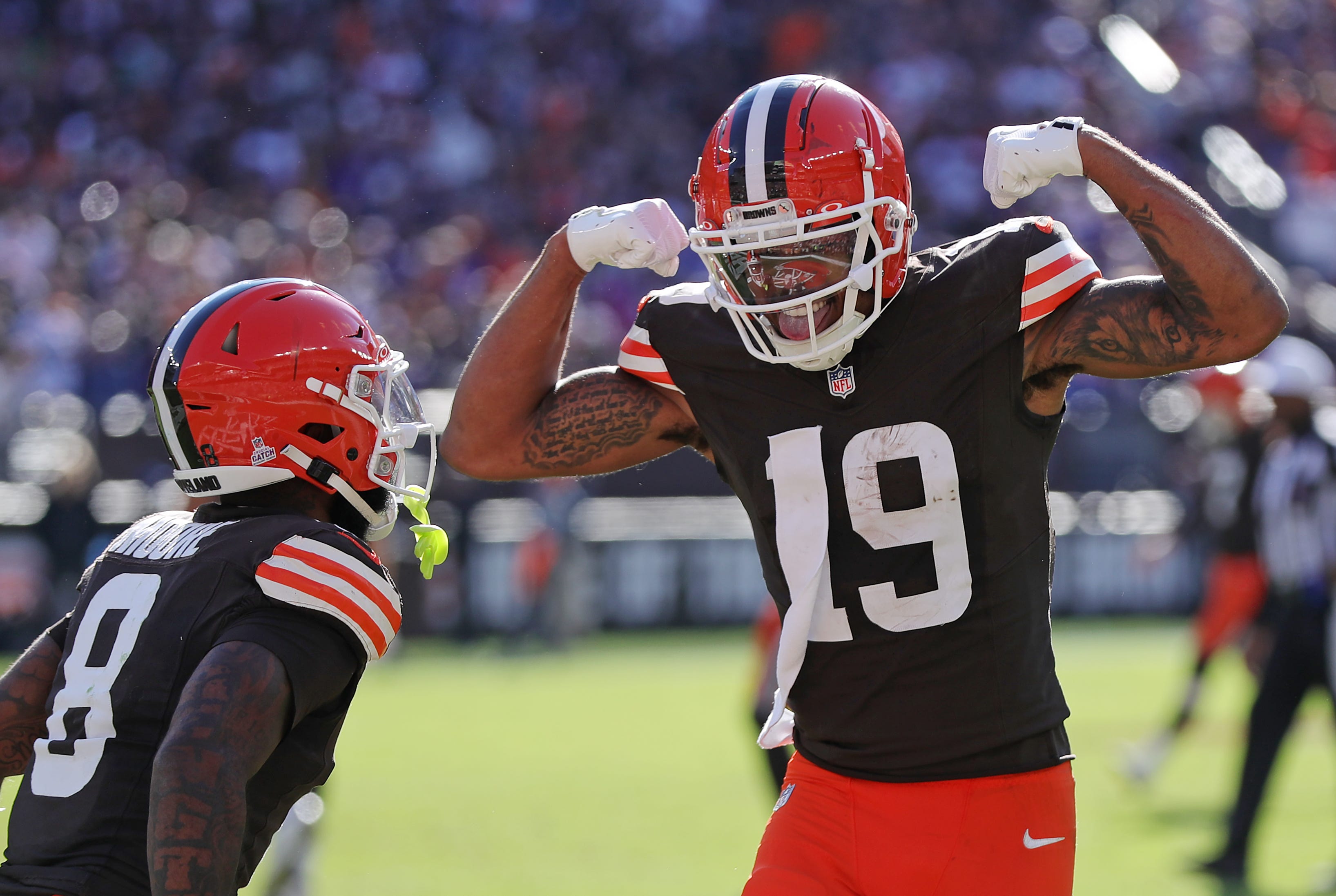 Cleveland Browns wide receiver Cedric Tillman (19) celebrates his touchdown with wide receiver Elijah Moore (8) during the second half of an NFL football game at Huntington Bank Field, Sunday, Oct. 27, 2024, in Cleveland, Ohio.