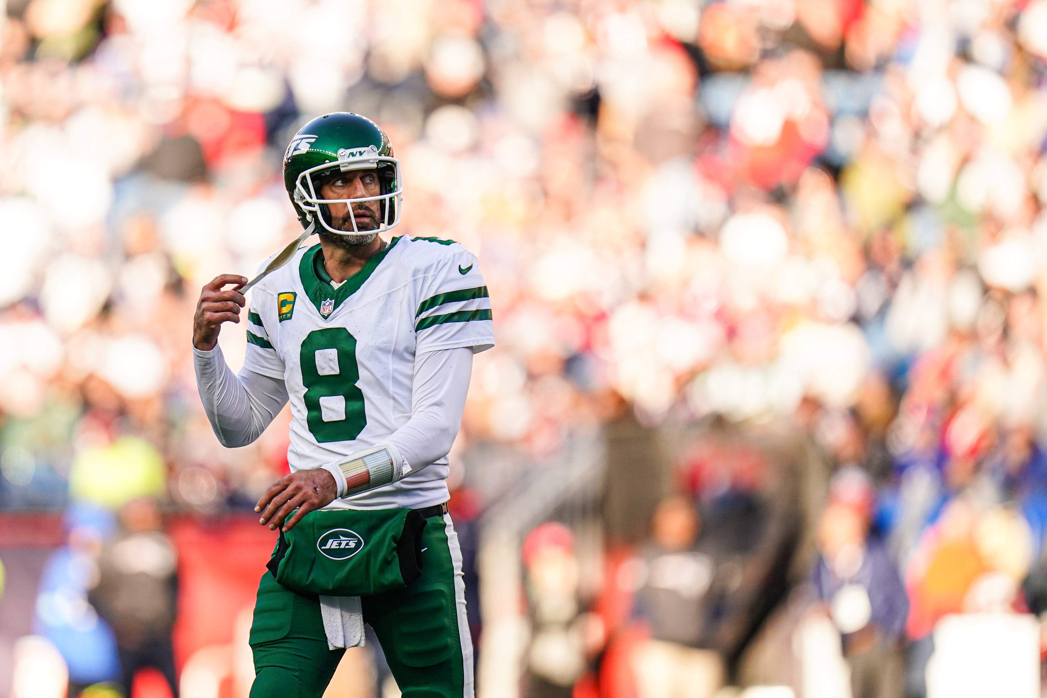 New York Jets quarterback Aaron Rodgers (8) on the field against the New England Patriots in the second half at Gillette Stadium.