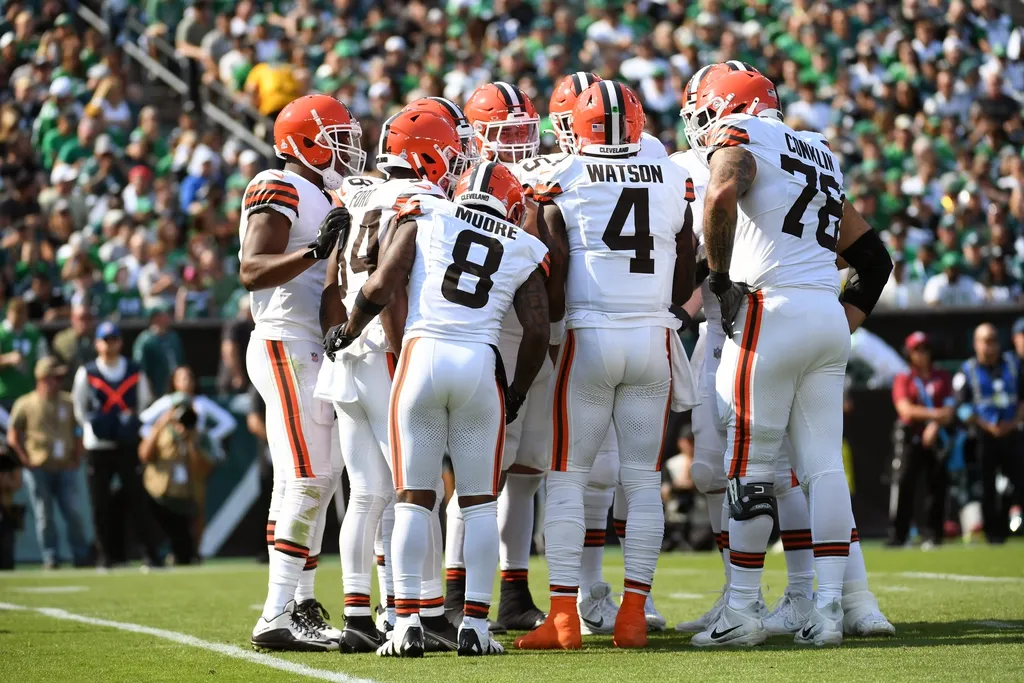 Cleveland Browns quarterback Deshaun Watson (4) leads the team in the huddle against the Philadelphia Eagles at Lincoln Financial Field.