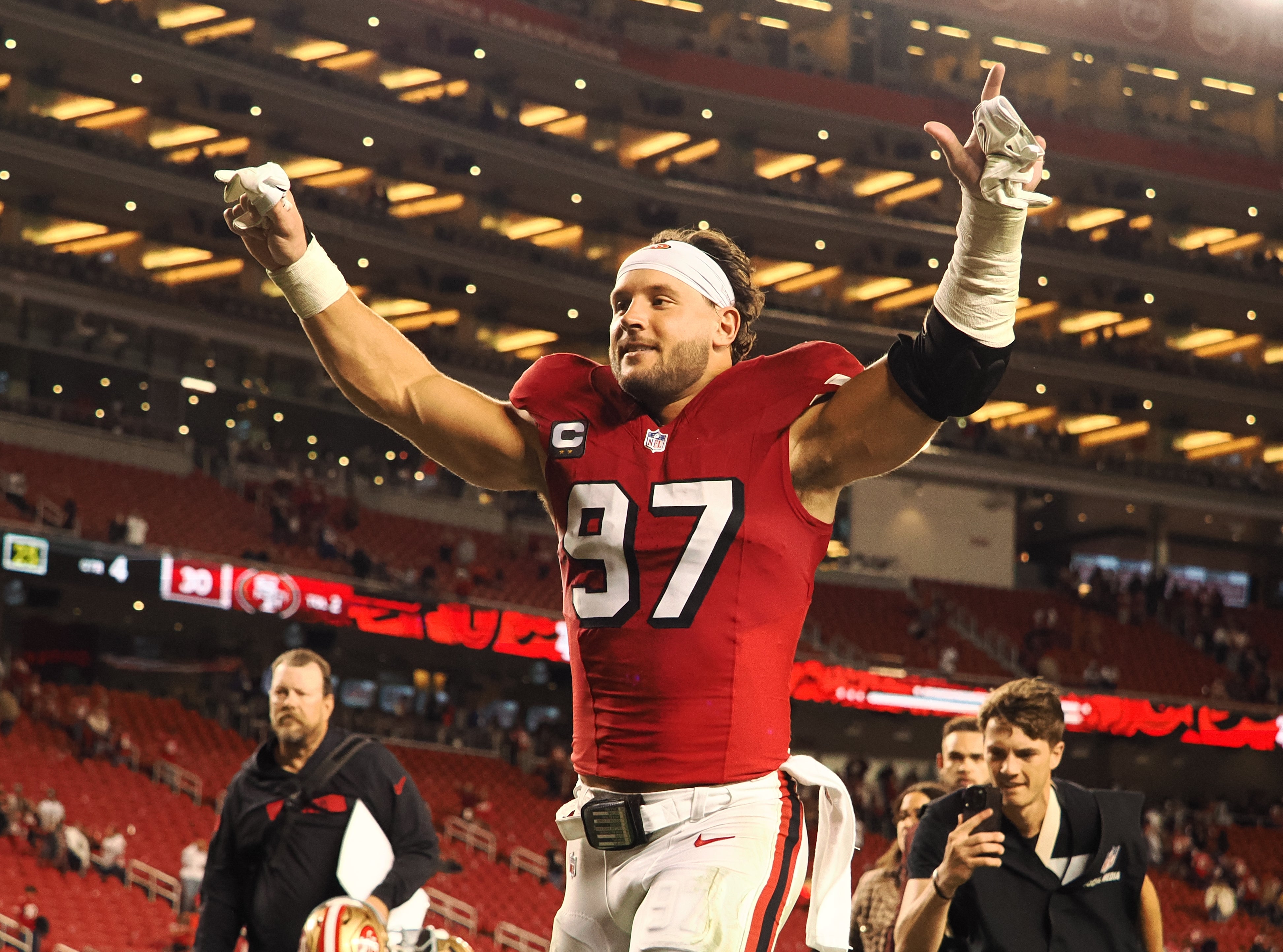 San Francisco 49ers defensive lineman Nick Bosa (97) celebrates as he leaves the field after the game against the Dallas Cowboys at Levi's Stadium.