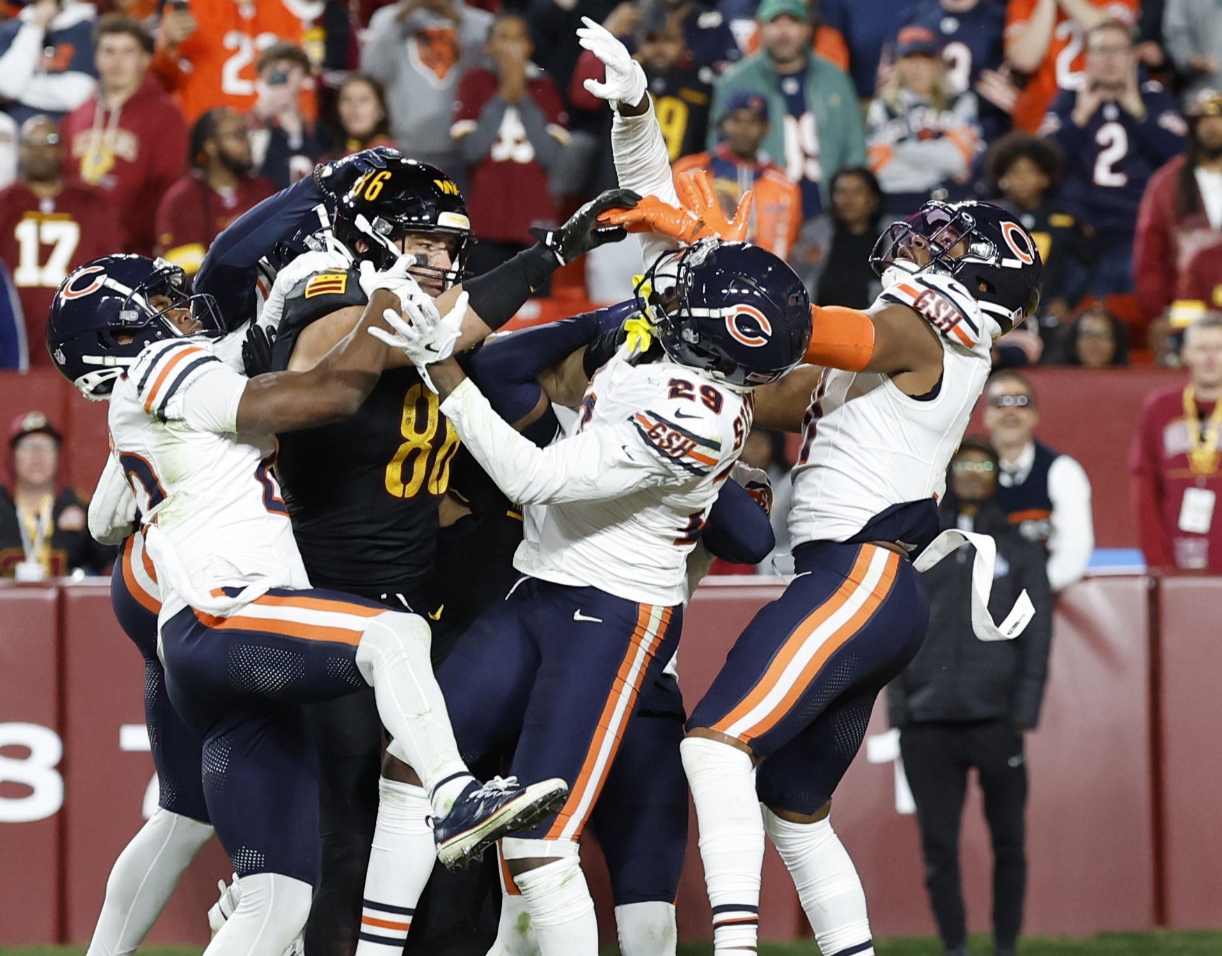 Oct 27, 2024; Landover, Maryland, USA; Washington Commanders wide receiver Noah Brown (85) prepares to catch a game-winnning Hail Mary pass on the final play of the game against the Chicago Bears at Northwest Stadium.