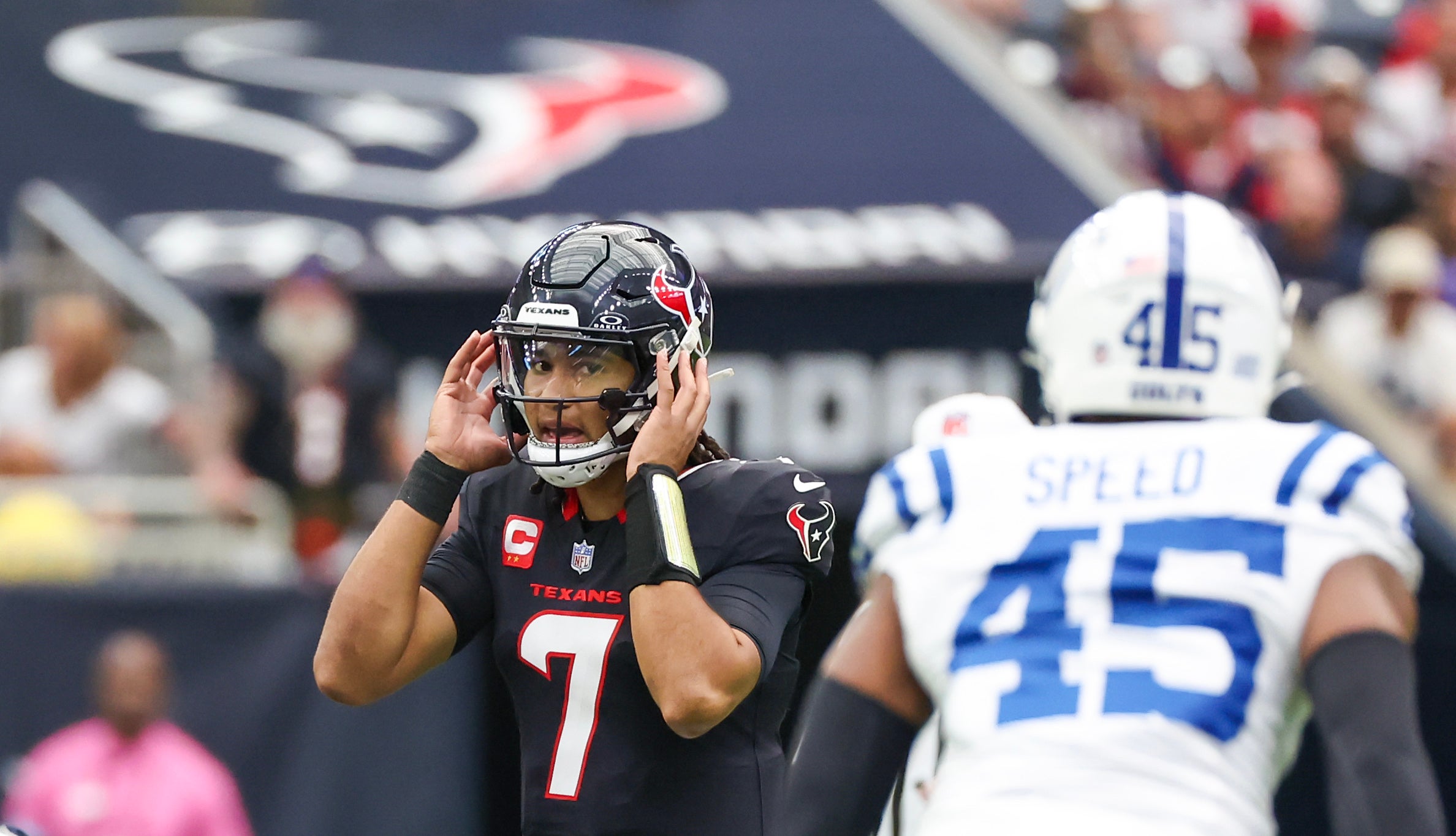 Oct 27, 2024; Houston, Texas, USA; Houston Texans quarterback C.J. Stroud (7) listens to the play against the Indianapolis Colts linebacker E.J. Speed (45) in the first quarter at NRG Stadium.