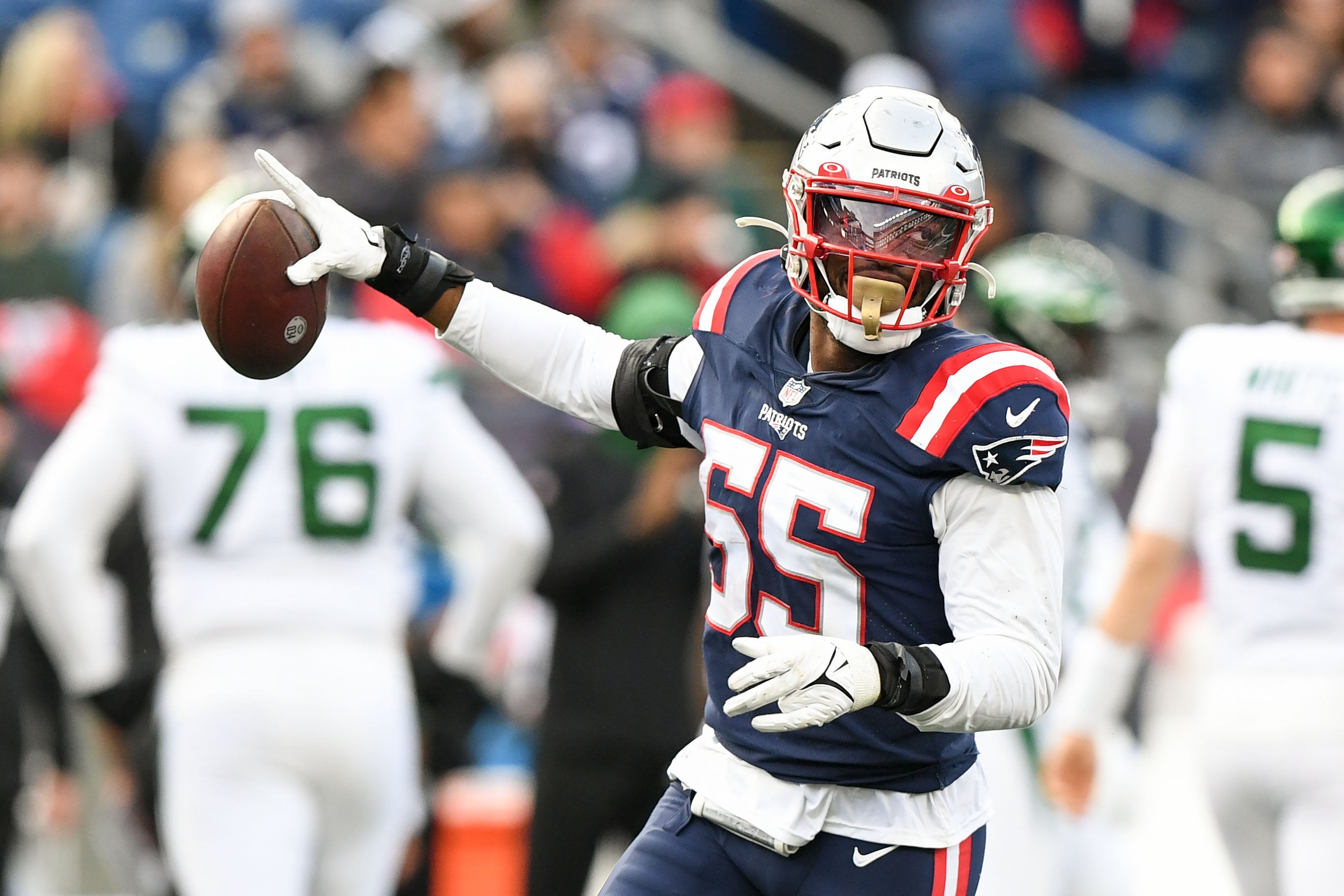 Oct 24, 2021; Foxborough, Massachusetts, USA; New England Patriots linebacker Josh Uche (55) reacts after recovering a fumble against the New York Jets during the second half at Gillette Stadium.